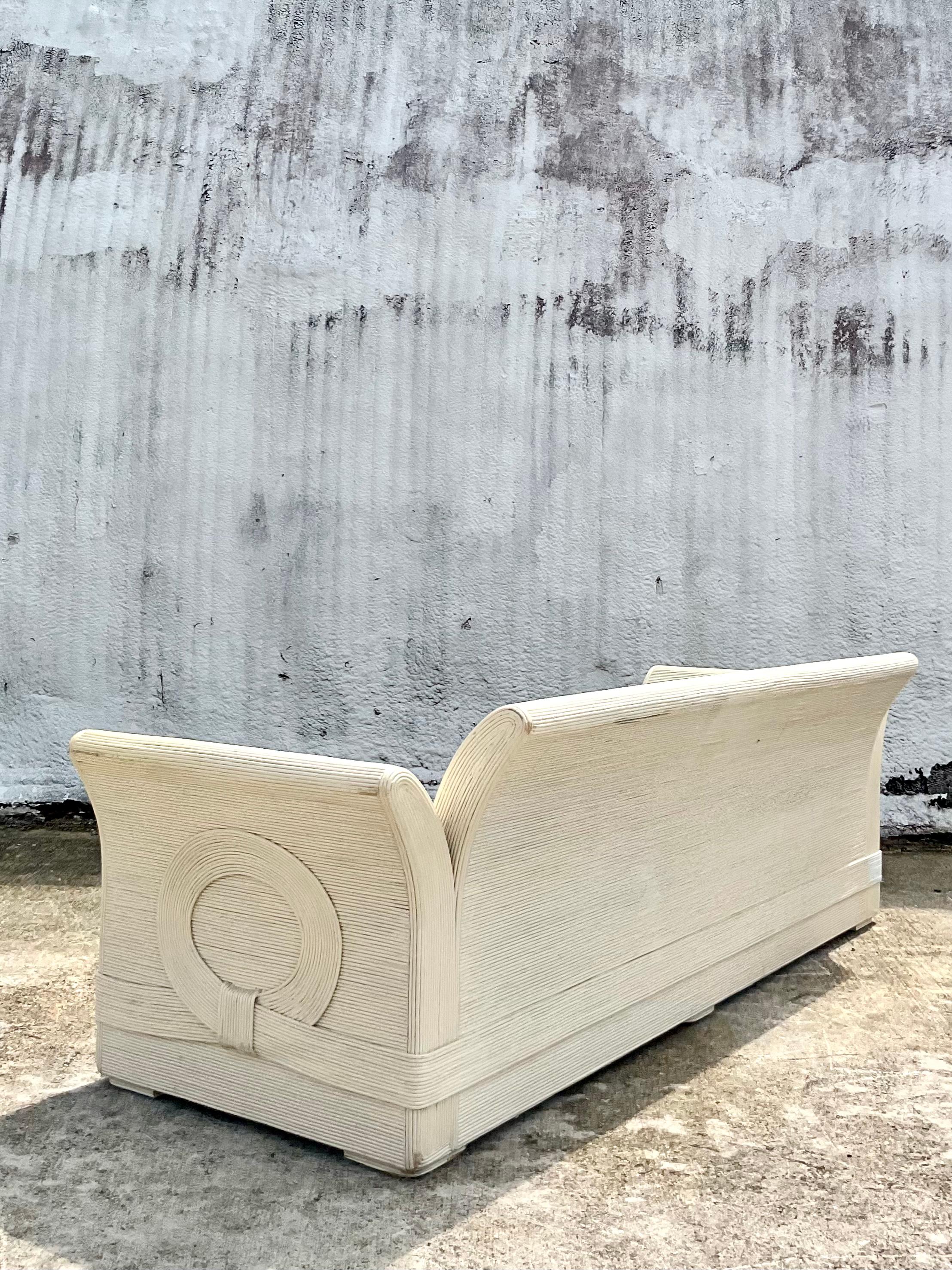 North American Vintage Coastal Pencil Reed Sofa After Betty Cobonpue