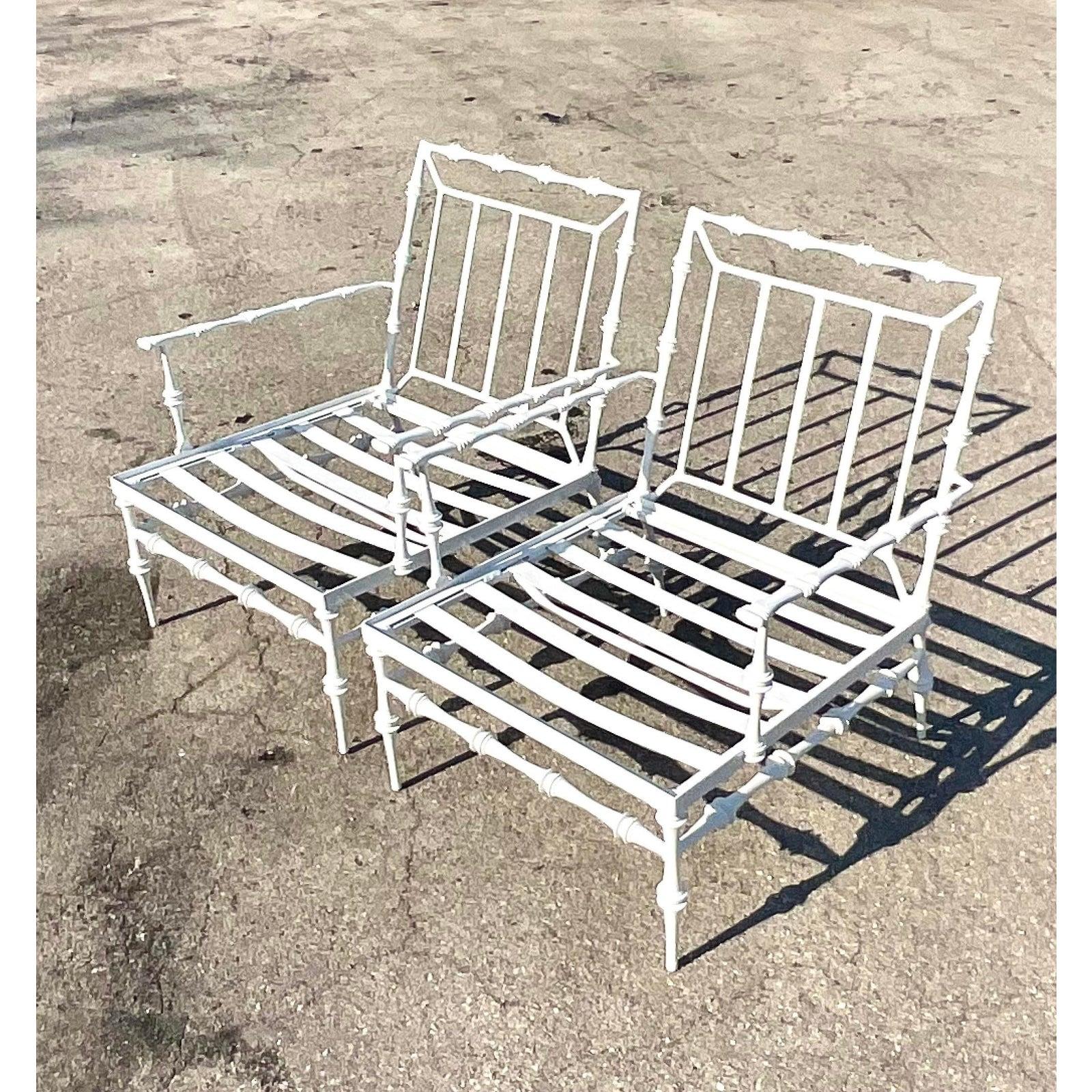 Fantastic pair of vintage cast aluminum lounge chairs. Made by the iconic Phyllis Morris group. Beautiful faux bamboo design with chic deep seats. Fully restored with all new sand blasting and powder coating in a high gloss white. Acquired from a