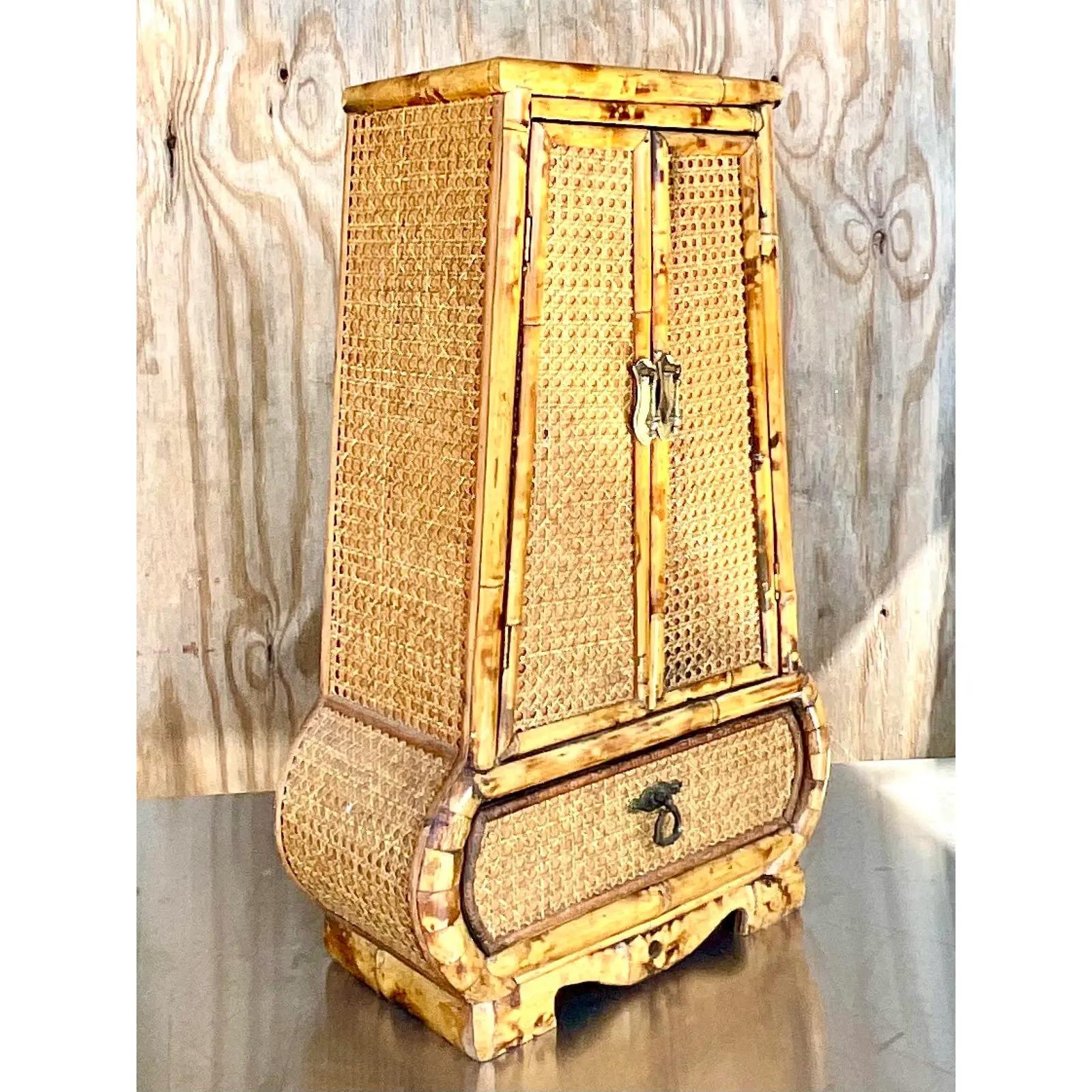 20th Century Vintage Coastal Rattan and Cane Tabletop Keyhole Cabinet