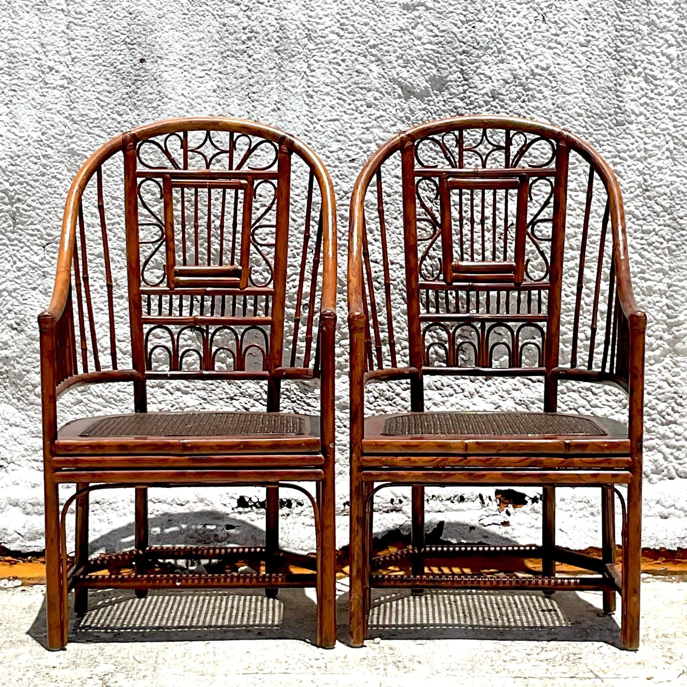Bring coastal elegance to your home with this pair of Vintage Coastal Rattan Brighton Pavillon Chairs. Featuring intricate rattan craftsmanship and a breezy, relaxed vibe, these chairs are perfect for adding seaside charm to any room. 