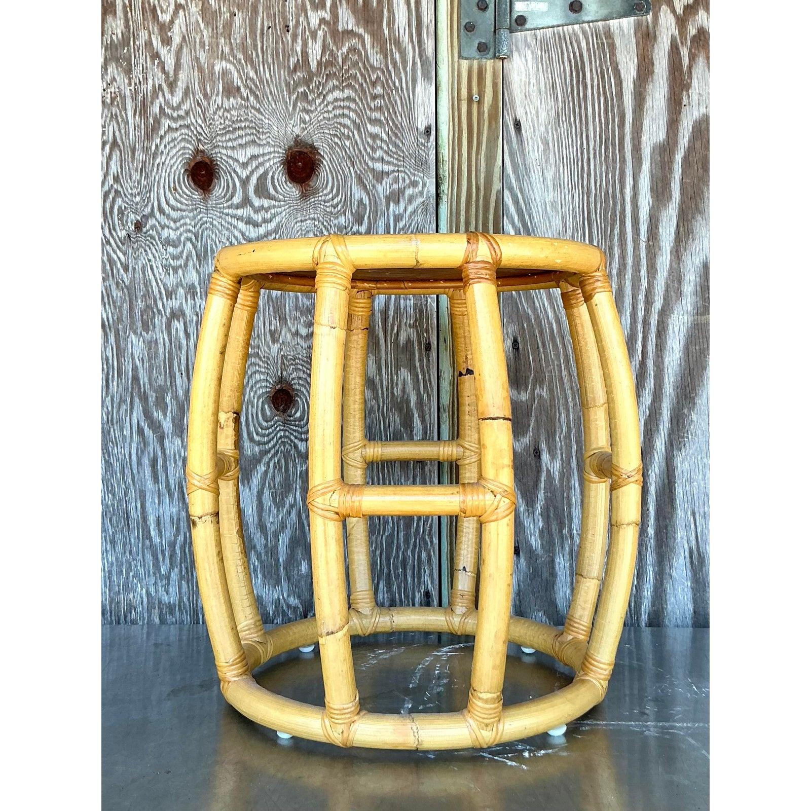 Infuse your living space with a touch of organic charm and vintage allure with this delightful Vintage Coastal Rattan Low Stool. This charming piece showcases the inherent beauty and versatility of natural materials, featuring a robustly constructed