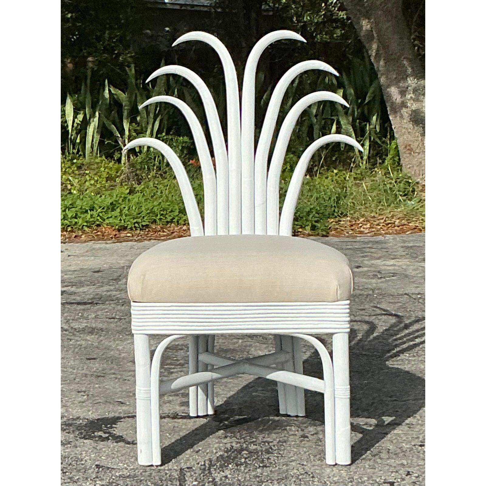 Discover the charm of this Vintage Coastal Rattan Pineapple Chair, a whimsical masterpiece that brings tropical elegance to any interior. Crafted from intricately woven rattan with a striking pineapple-inspired backrest, this chair exudes the
