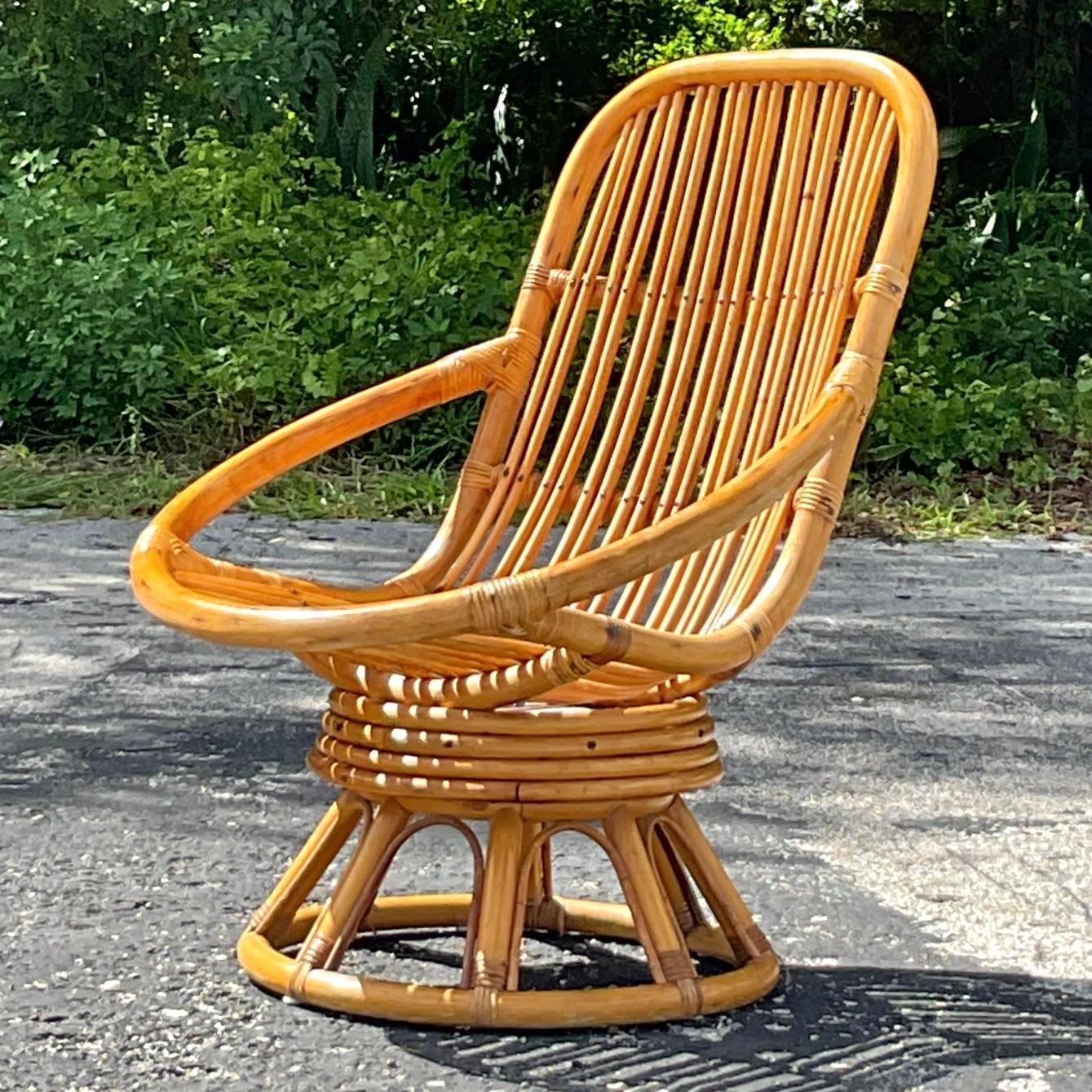 20th Century Vintage Coastal Rattan Swivel Lounge Chair For Sale