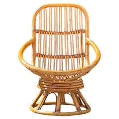 Used Coastal Rattan Swivel Lounge Chair