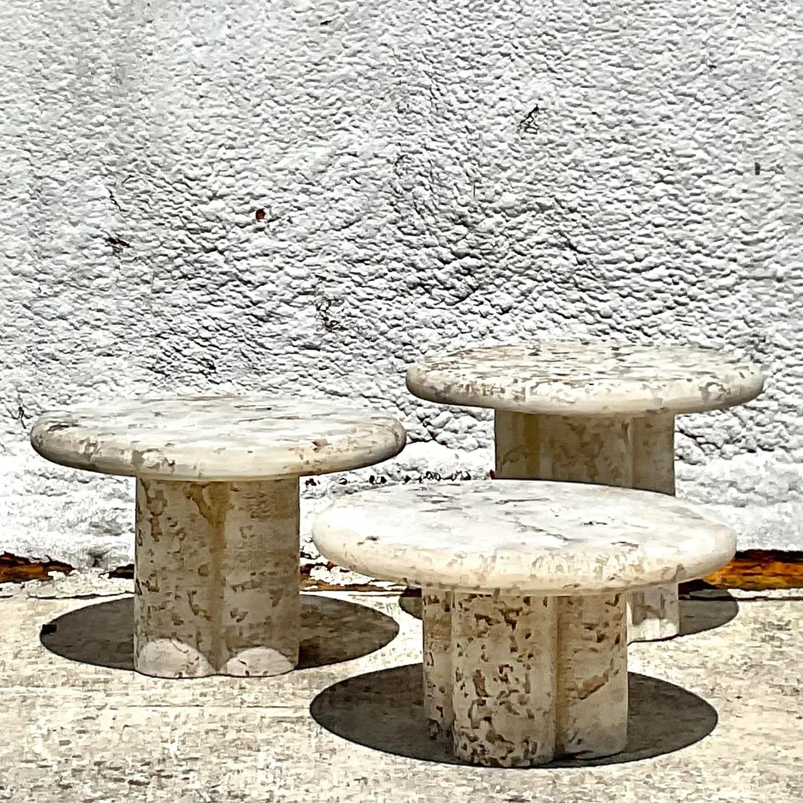 A chic trio of faux coral drinks tables. Made from resin and done in ascending sizes. Acquired from a Palm Beach estate.