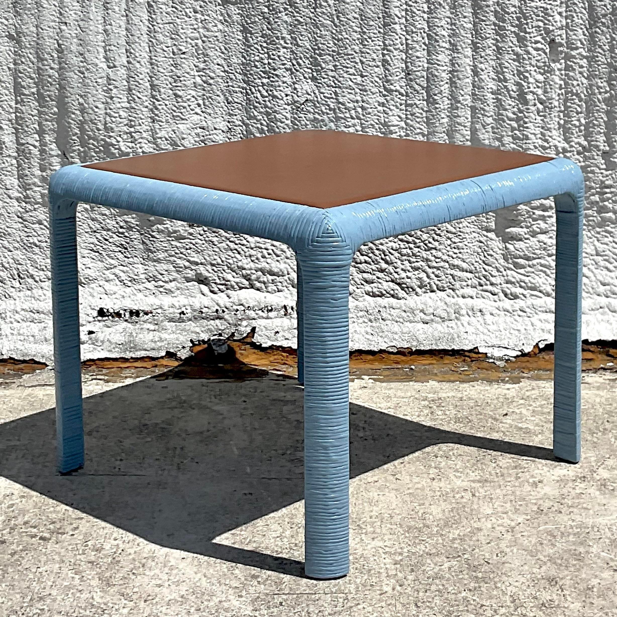 An exceptional vintage z coastal game table. Custom designed by the legendary Scott z sanders for the 2023 Kips Bay Palm Beach Showhouse. Beautiful wrapped rattan with a chic caramel leather top. The most beautiful blue lacquered finish. A real