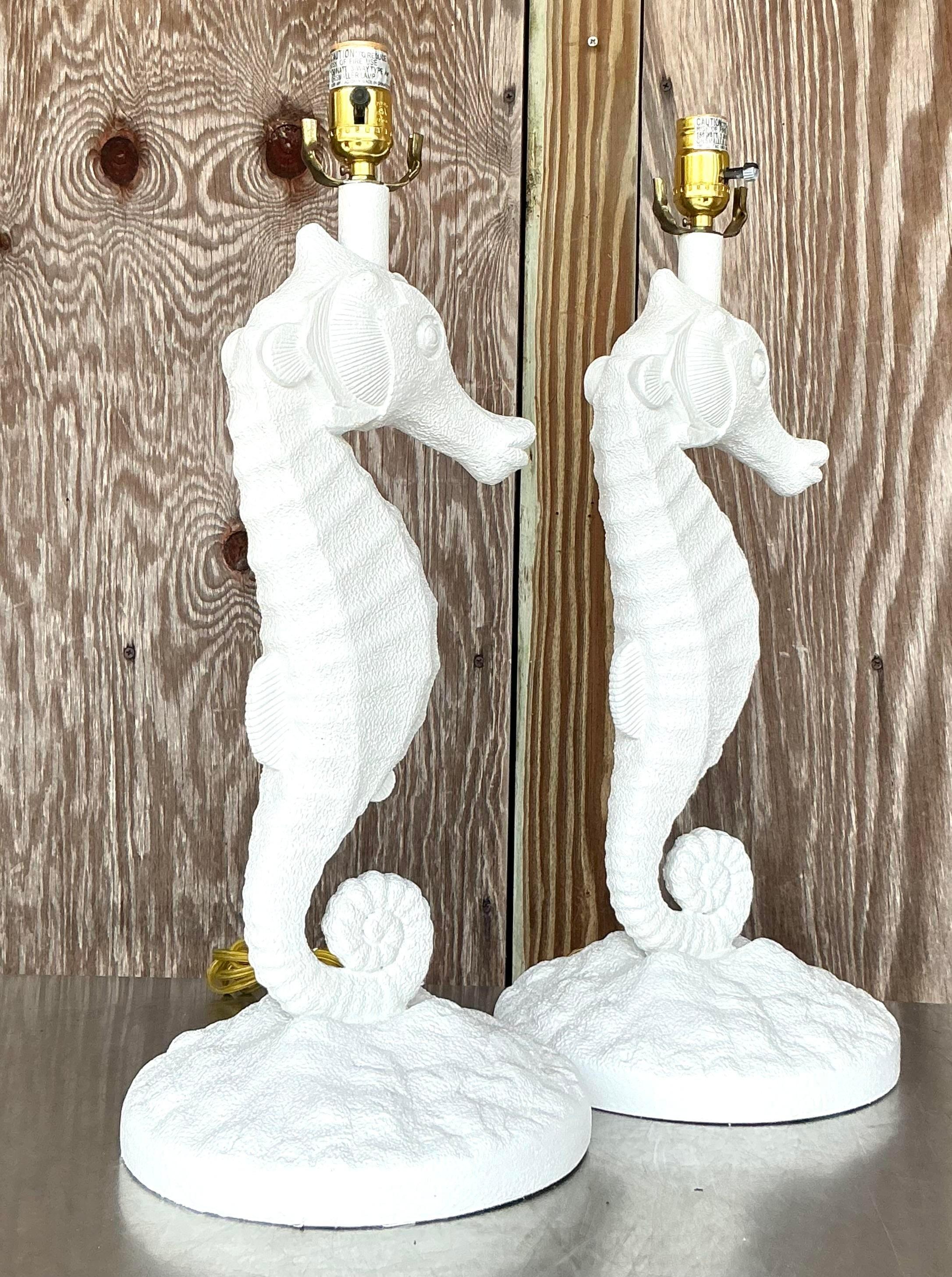 This charming pair of vintage coastal seahorse lamps, crafted from resin, brings a touch of seaside elegance to any space. The intricate detailing and coastal-inspired design make these lamps a perfect addition to a beach house or any room that