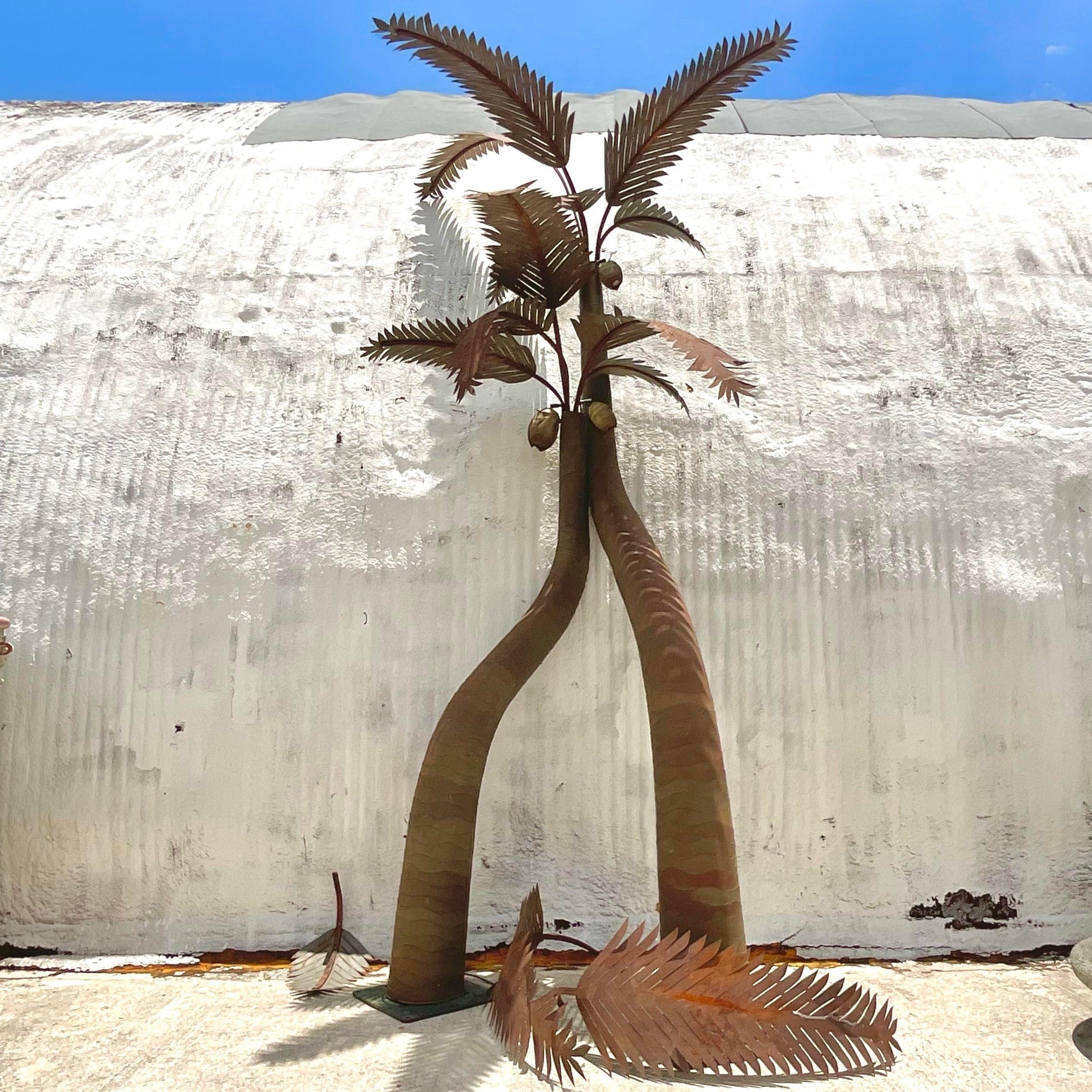 The Vintage Coastal Signed Monumental Palm Tree Lamps - Set Of 2 embody American coastal style with their stunning palm tree design and monumental presence. Signed by renowned artist, Wendell Turner, these lamps evoke the relaxed elegance of coastal