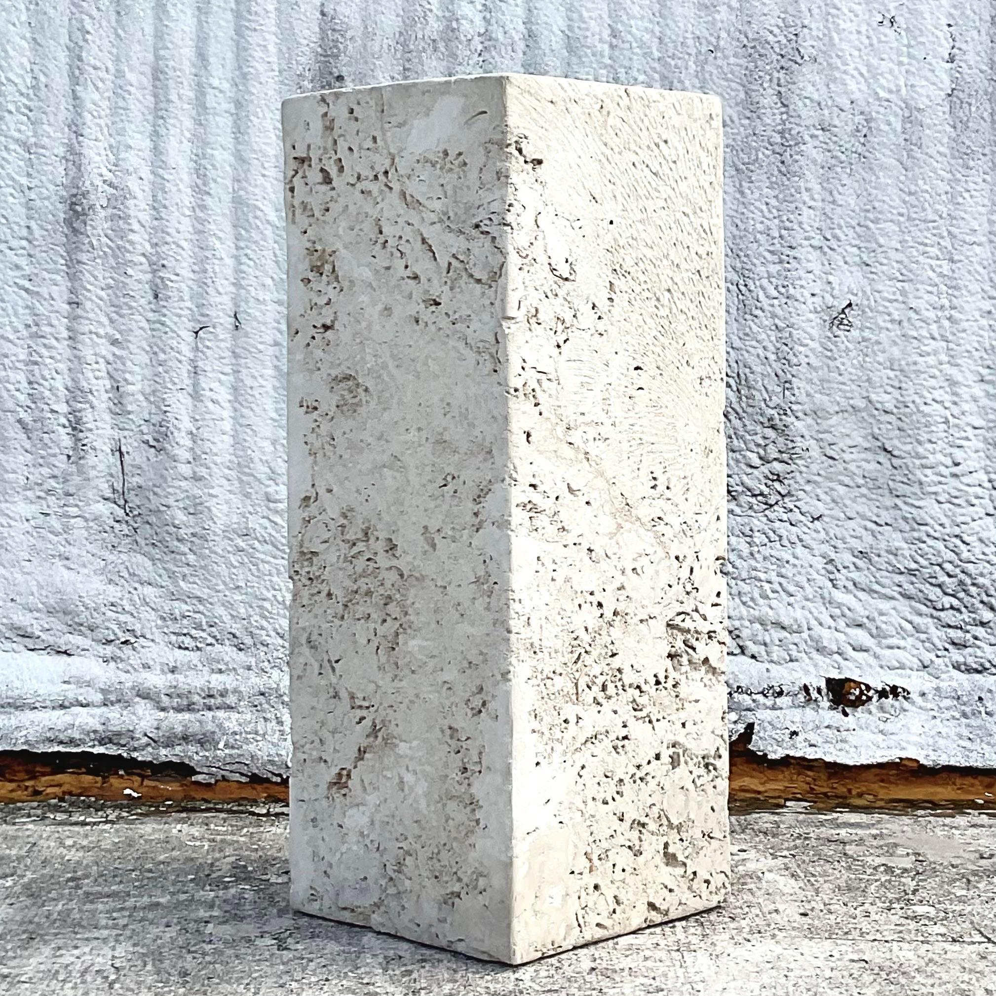 A fantastic vintage Coastal pedestal. A striking solid Coquina stone body in a chic and simple design. Incredible organic detail. Two pedestals available on my Chairish page. Acquired from a Palm Beach estate.