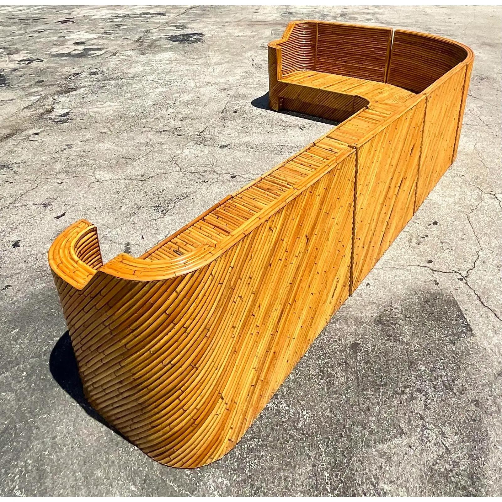 The most incredible vintage Coastal sectional sofa. Made from diagonally placed split rattan in a chic curved design. Beautiful from all sides. Ready to go! Acquired from a Palm Beach estate.