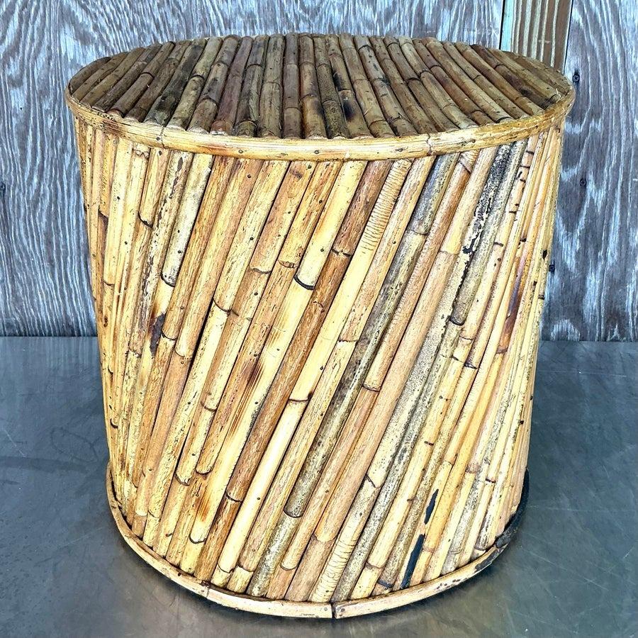 Bring natural charm and texture to your space with this vintage coastal split reed side table. Featuring intricately woven split reed craftsmanship and a smooth tabletop, this piece exudes casual elegance and seaside-inspired style. Perfect for