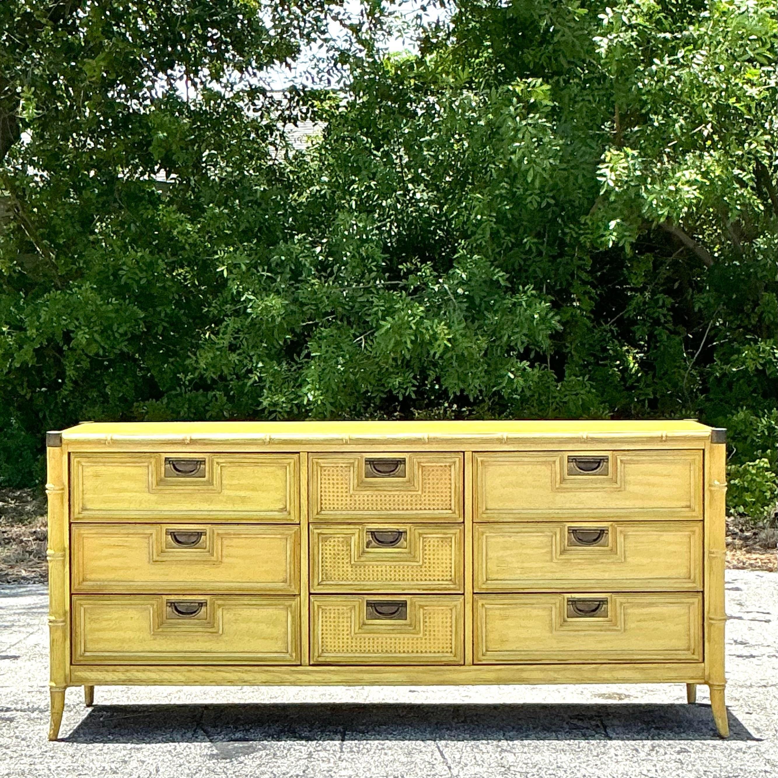 Elevate your bedroom decor with this Vintage Coastal Stanley Cane Front Dresser. Featuring a stylish cane front design and sturdy craftsmanship, this dresser exudes coastal elegance and timeless charm. Perfect for adding a touch of beach-inspired