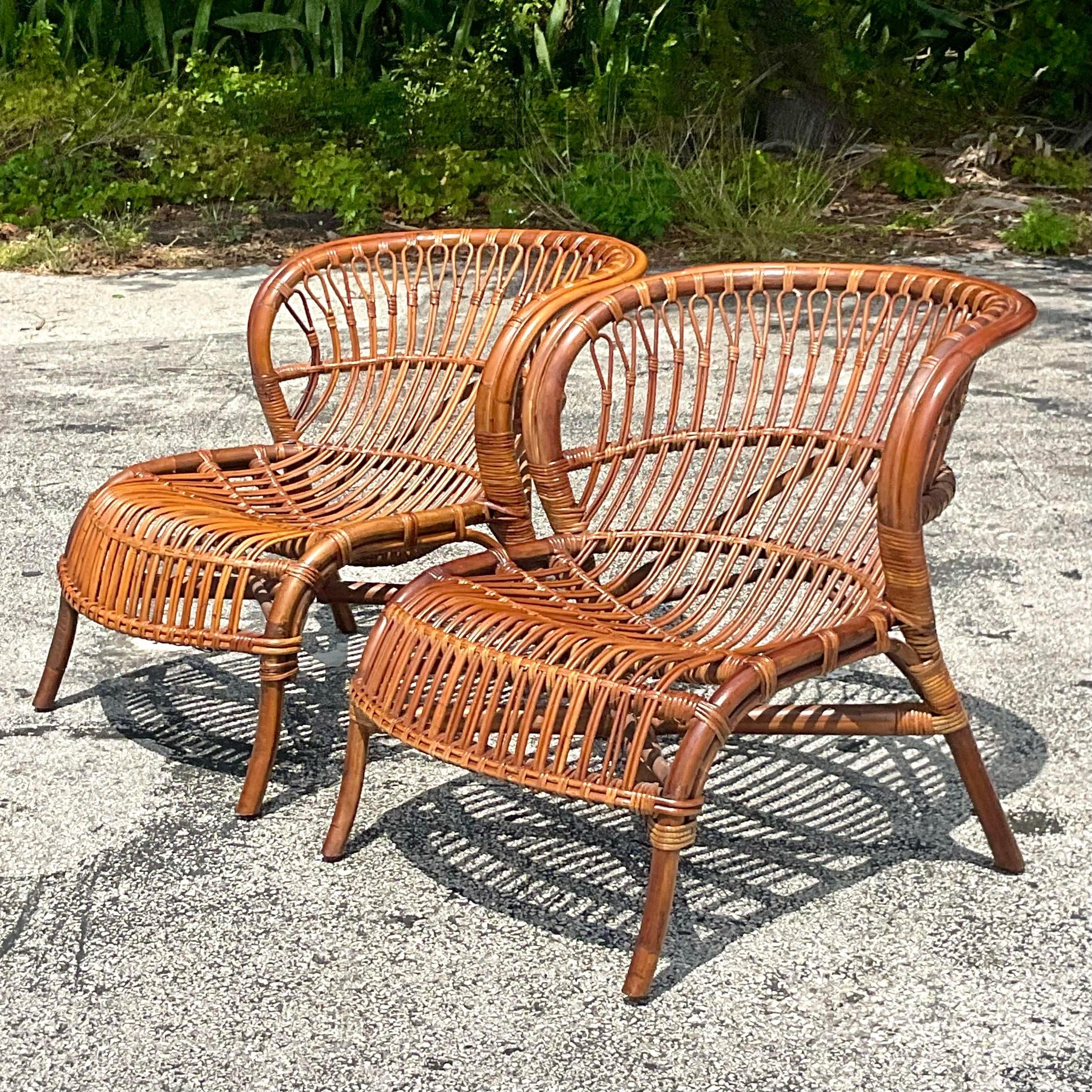 20th Century Vintage Coastal Stick Rattan Lounge Chairs - a Pair