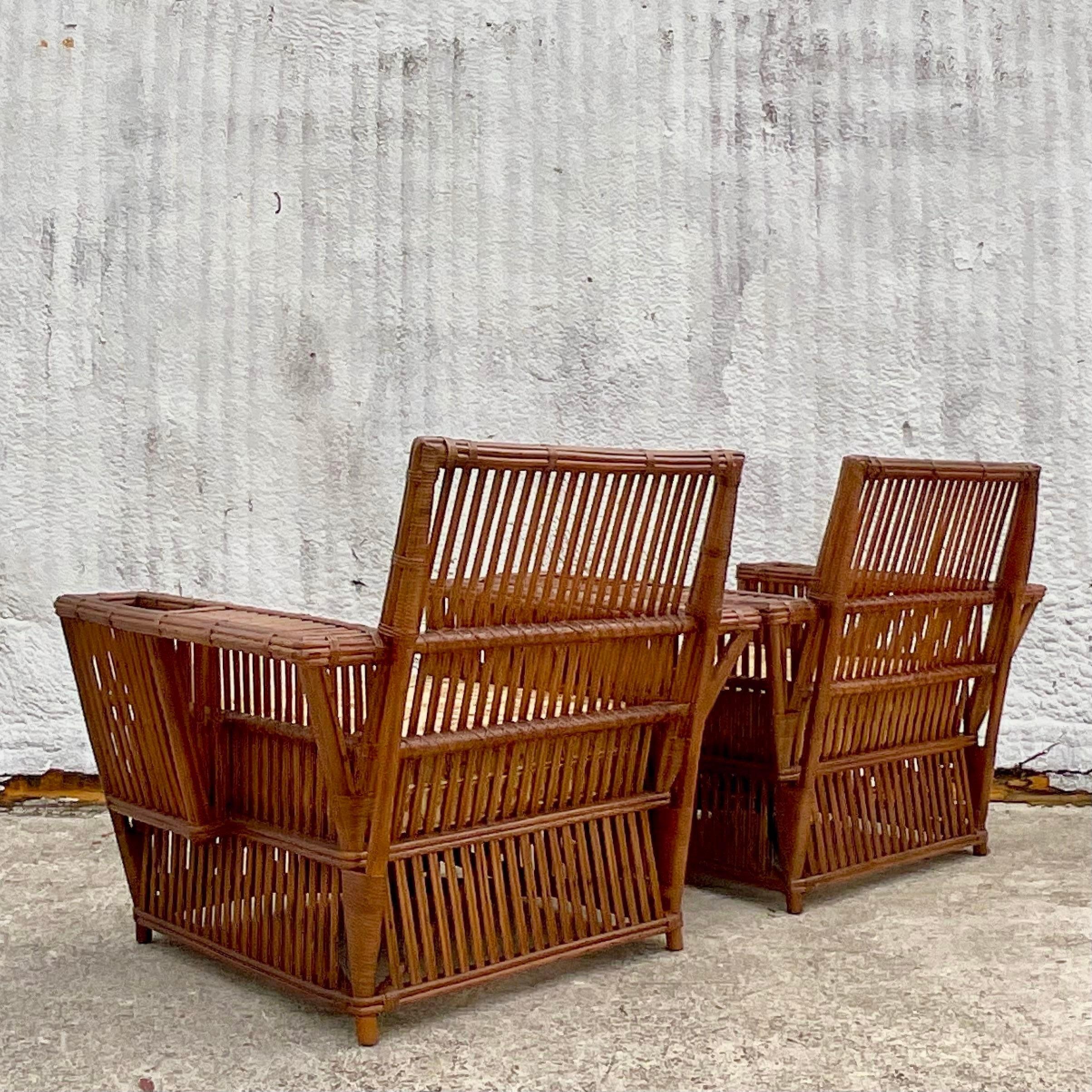 Experience the epitome of American coastal luxury with our Vintage Coastal Stick Rattan Lounge Chairs, reminiscent of the iconic Bielecky Brothers' style. Crafted with meticulous attention to detail, these chairs exude timeless elegance and