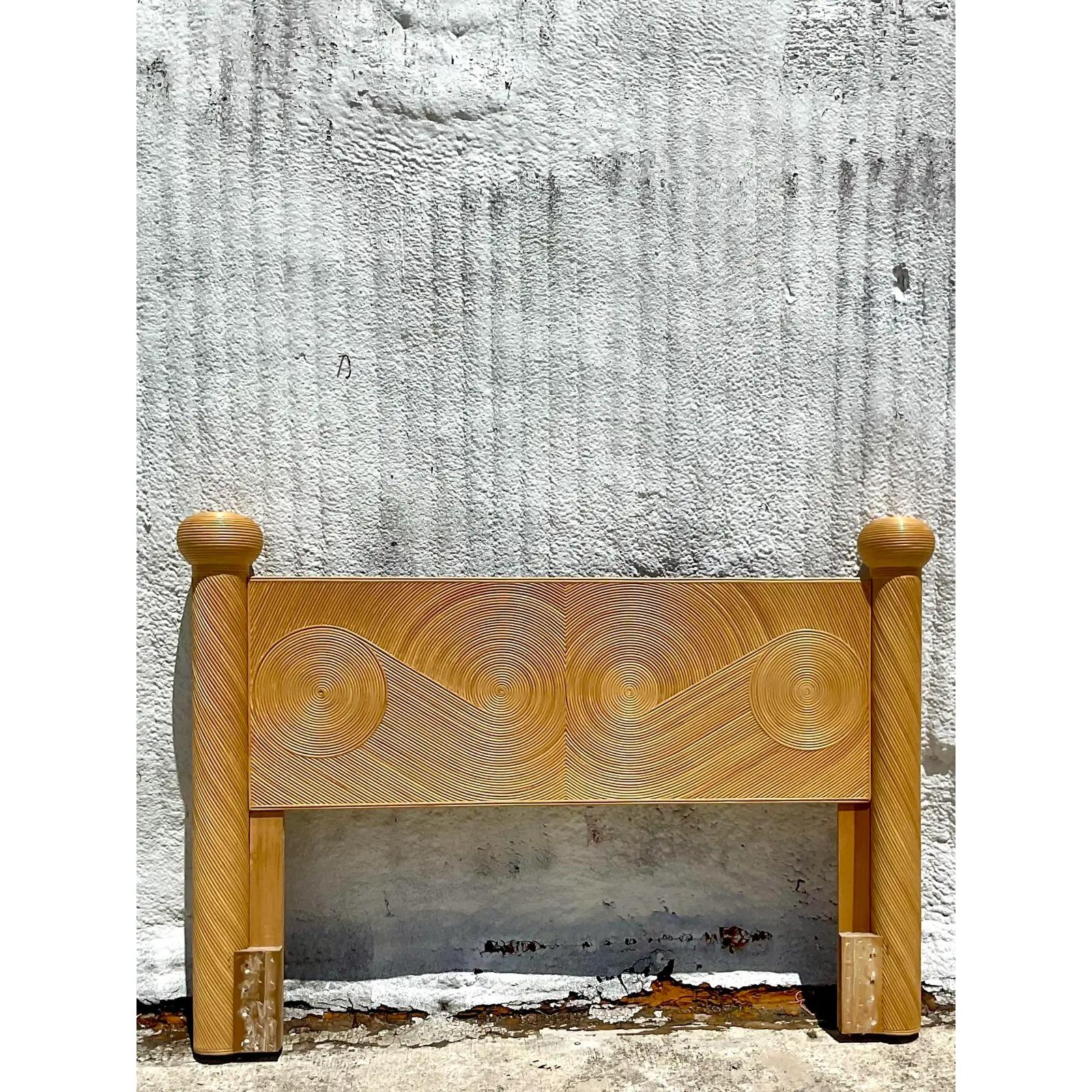 Fabulous vintage Queen headboard. Beautiful Coastal pencil reed in a chic swirl design. Acquired from a Palm Beach estate.