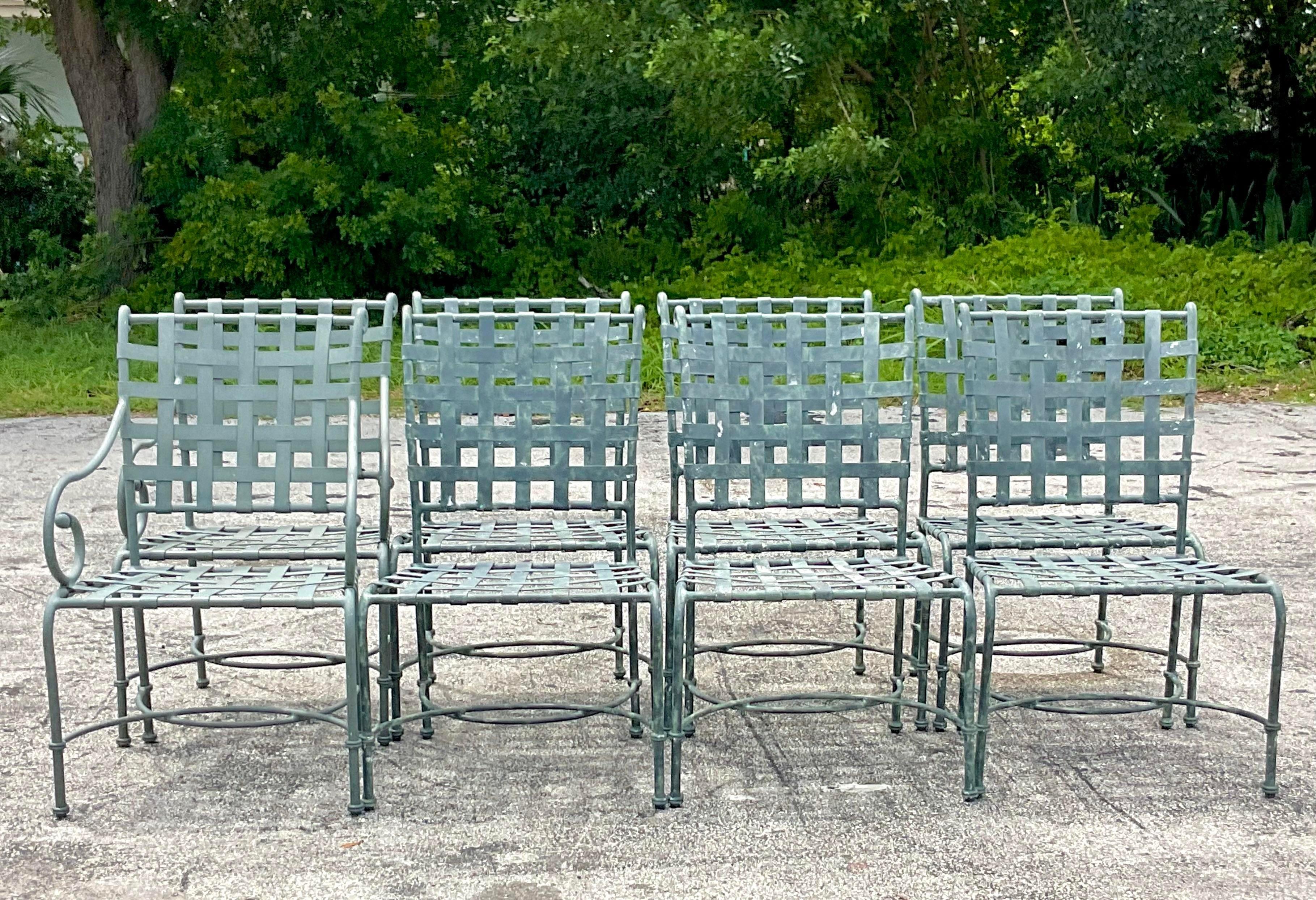 A fantastic set of 8 vintage Coastal outdoor dining chairs. Made by the iconic Brown Jordan group and tagged on the back. A chic verdigris finish on a cast aluminum frame. The coveted “Florentine” pattern. 6 more chairs also available on my page.
