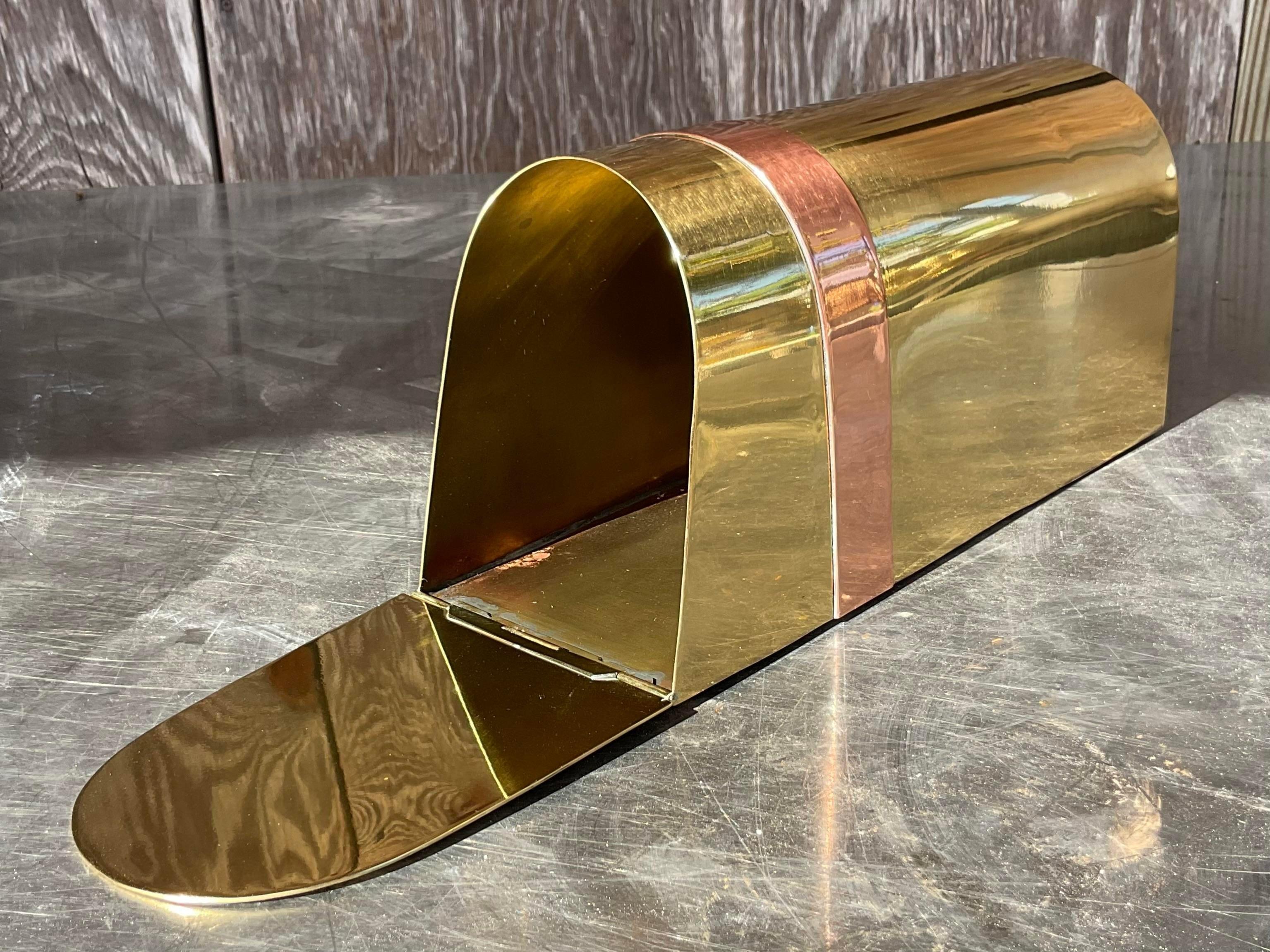 A rare and unusual vintage Brass mailbox. Made by the iconic Sarreid group and tagged on the back. A real conversation pieces. Acquired from a Palm Beach estate.
