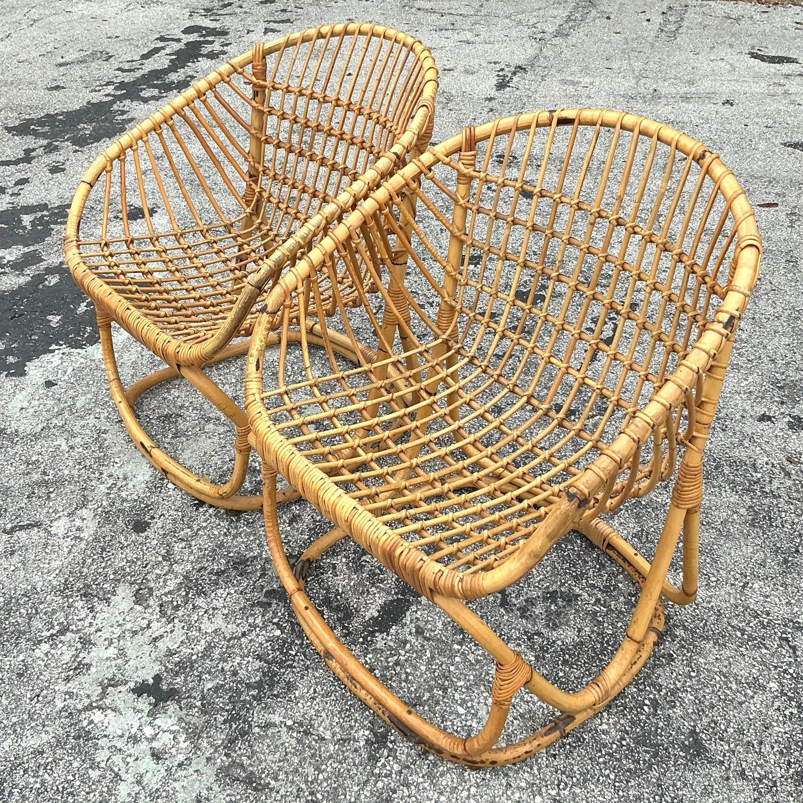 Vintage Coastal Tito Agnoli Woven Rattan Lounge Chairs - a Pair In Good Condition In west palm beach, FL