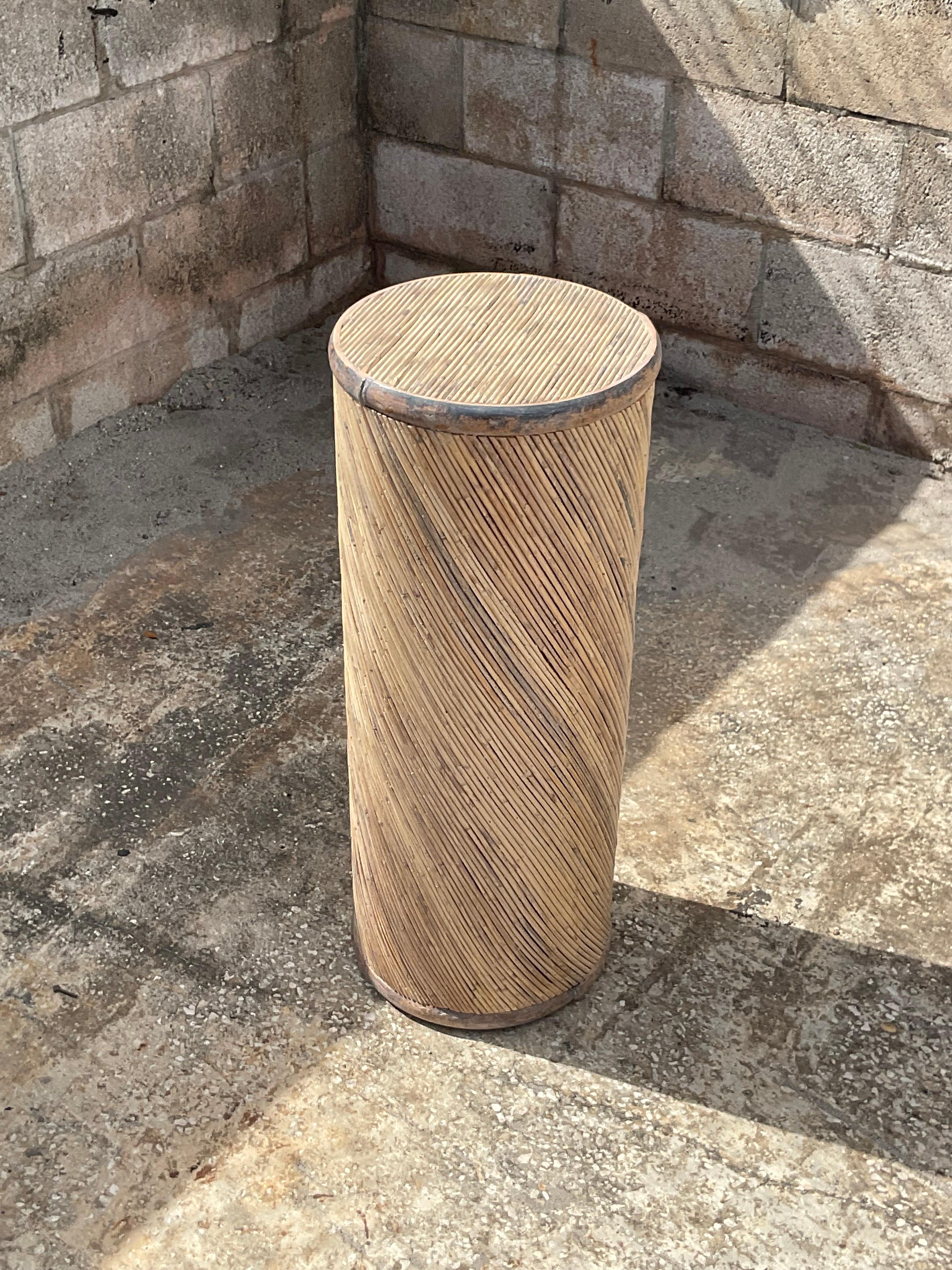 Beautiful vintage Coastal pedestal. Made from a twisted pencil reed with a tortoise shell finish. Perfect for your sculptures or orchids. A versatile little addition to any room. Acquired from a Palm Beach estate. 