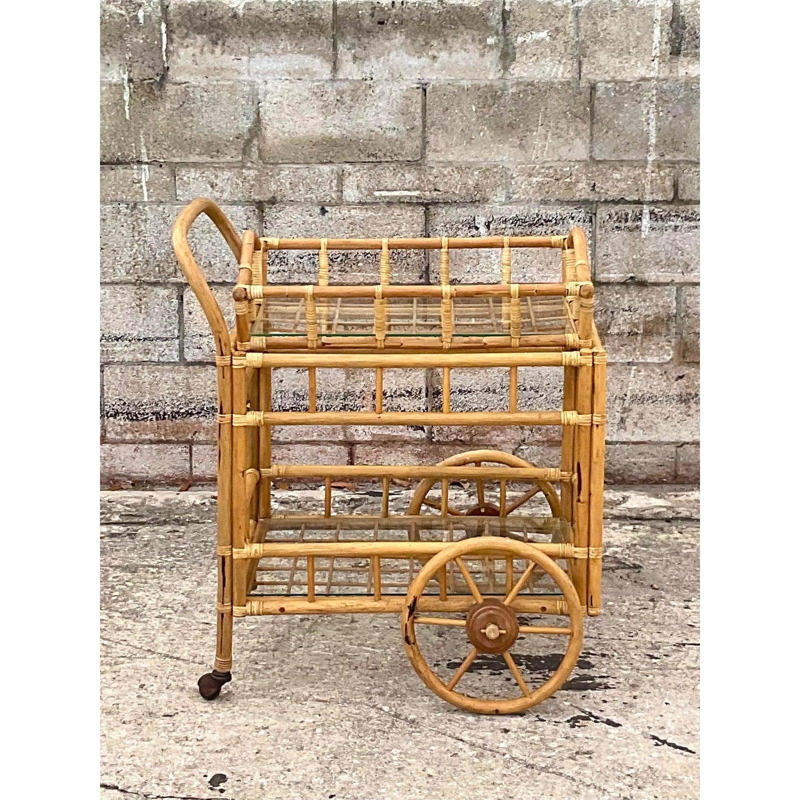Fantastic vintage bent rattan bar cart. Beautiful, removable tray top makes it beautiful and functional. Unusual and attractive. Acquired from Palm Beach estate.