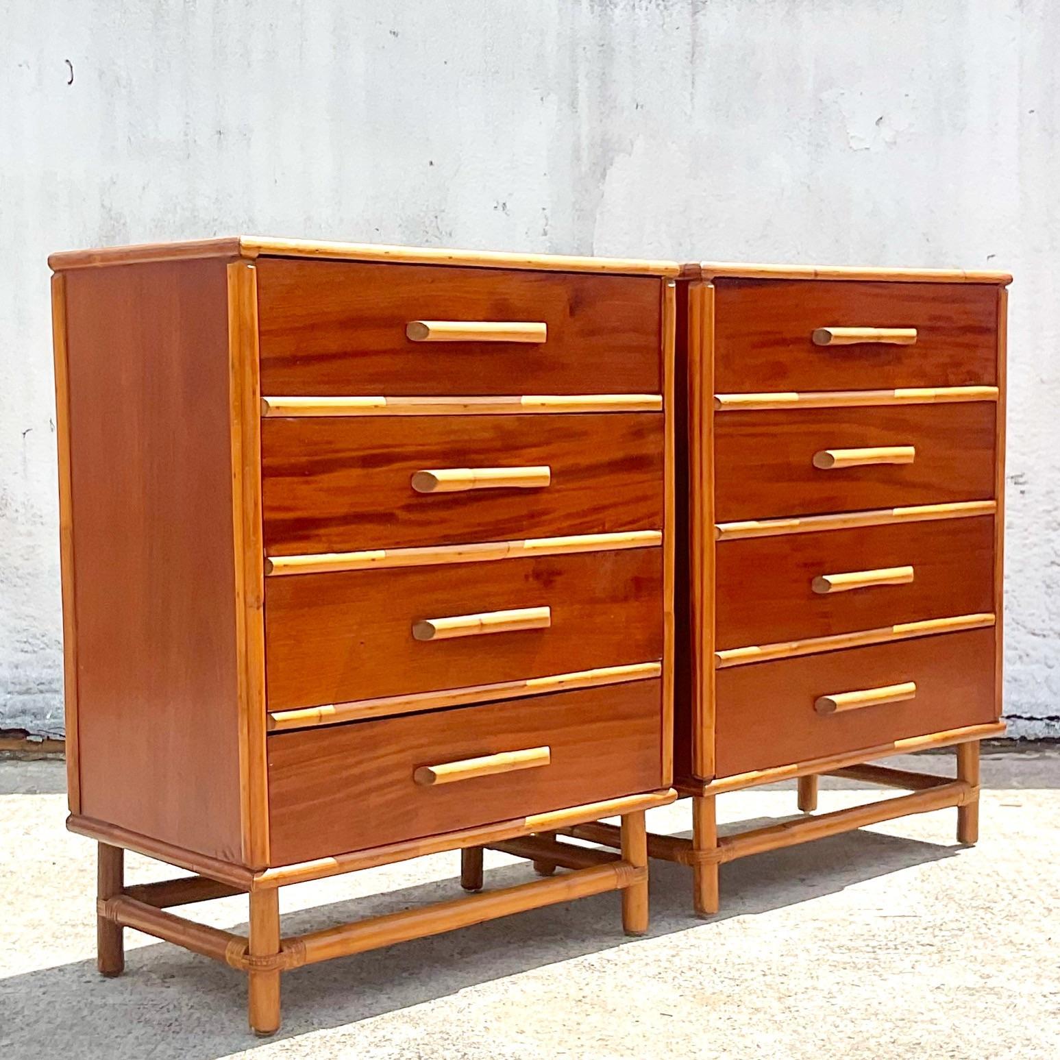 An exceptional pair of vintage 1950s Coastal chest of drawers. Beautiful and tall Mahogany cabinets with rattan trim. Chis brass caps on the ends. Matching dresser also available on my Chairish page. Acquired from a Palm Beach estate. 