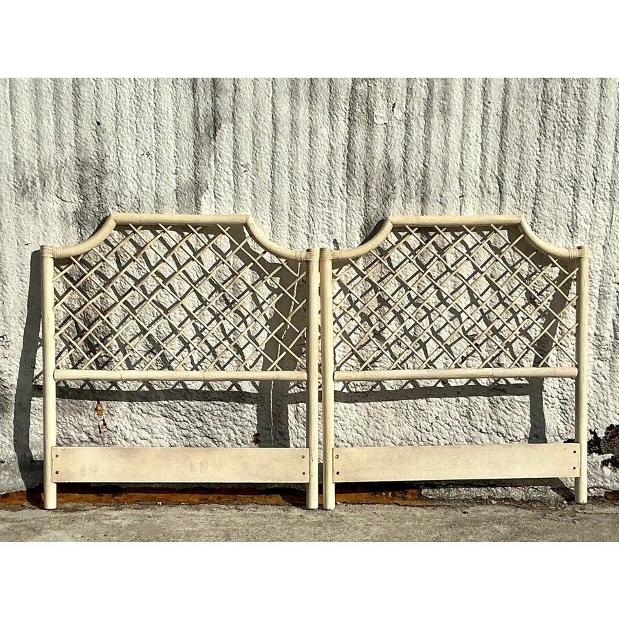 Bring breezy elegance to your bedroom with these vintage coastal trellis rattan twin headboards. Featuring intricate trellis patterns and natural rattan craftsmanship, these headboards capture the essence of relaxed, seaside living. Their versatile