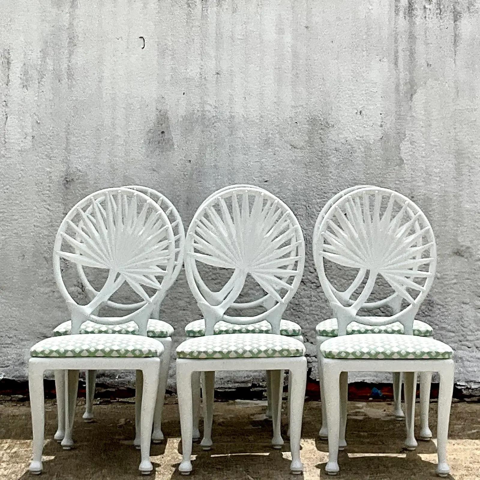 Stunning set of 6 vintage Coastal Tropitone outdoor dining chairs. Made in a durable cast aluminum in a chic palm leaf design. Acquired from a Palm Beach estate.