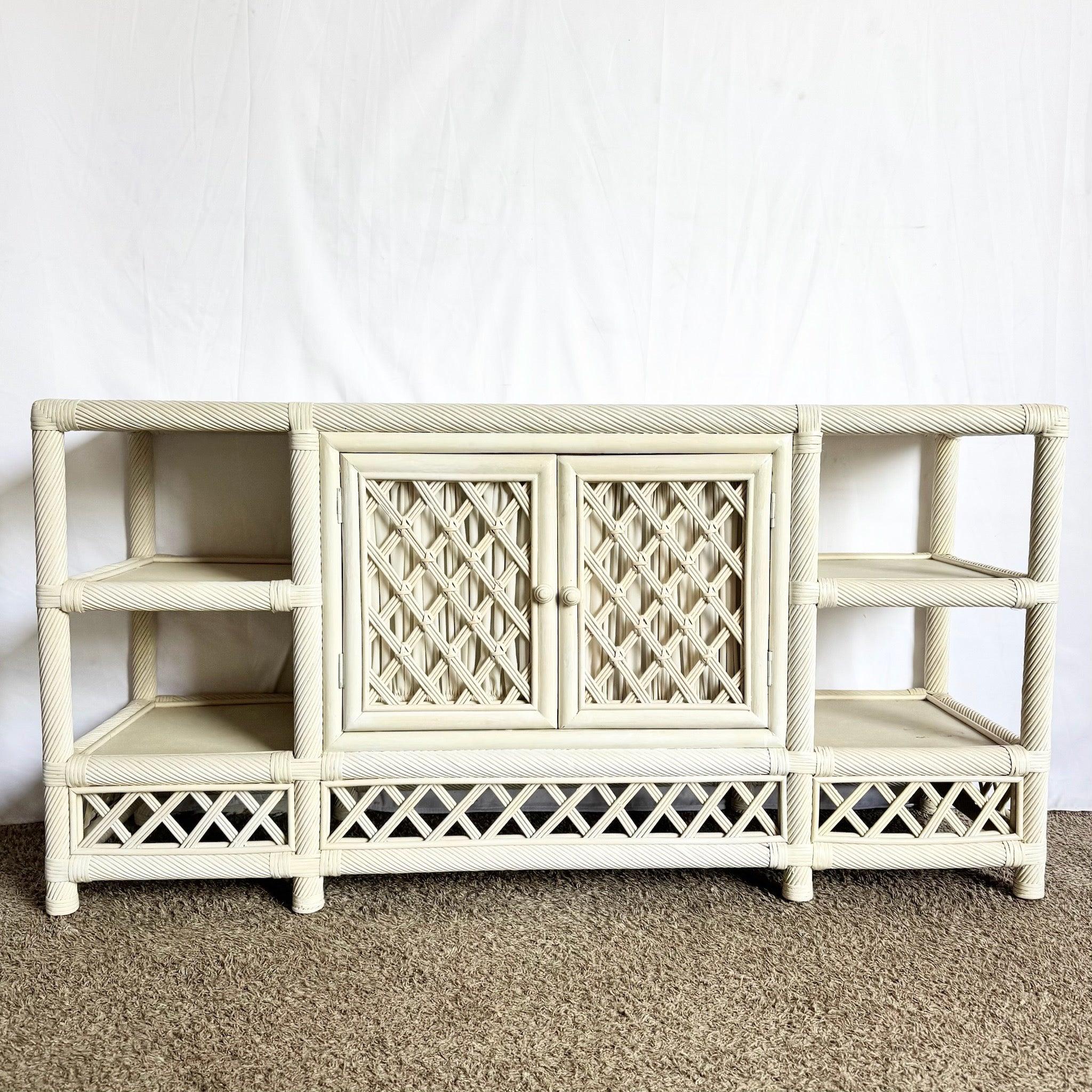 Coastal Twisted Reed Rattan Credenza with sculptural twisted‑reed frame, woven doors, and versatile storage—perfect for sunlit, relaxed interiors.
 

 We sell items as acquired, without restoring or repairing. Vintage pieces may have age-related