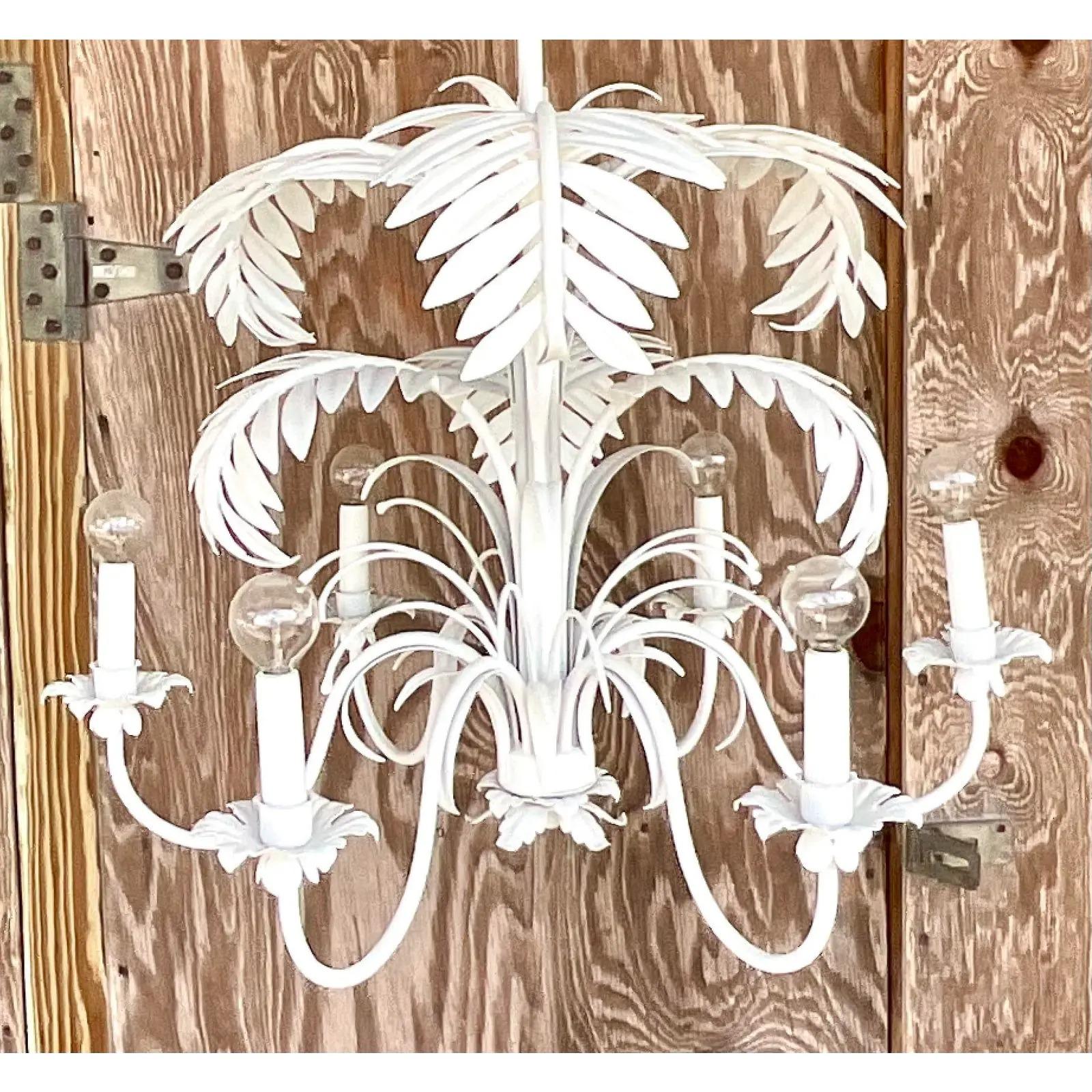 Vintage Coastal painted white chandelier. The coveted palm frond design. Large and impressive. Acquired from a Palm Beach estate.