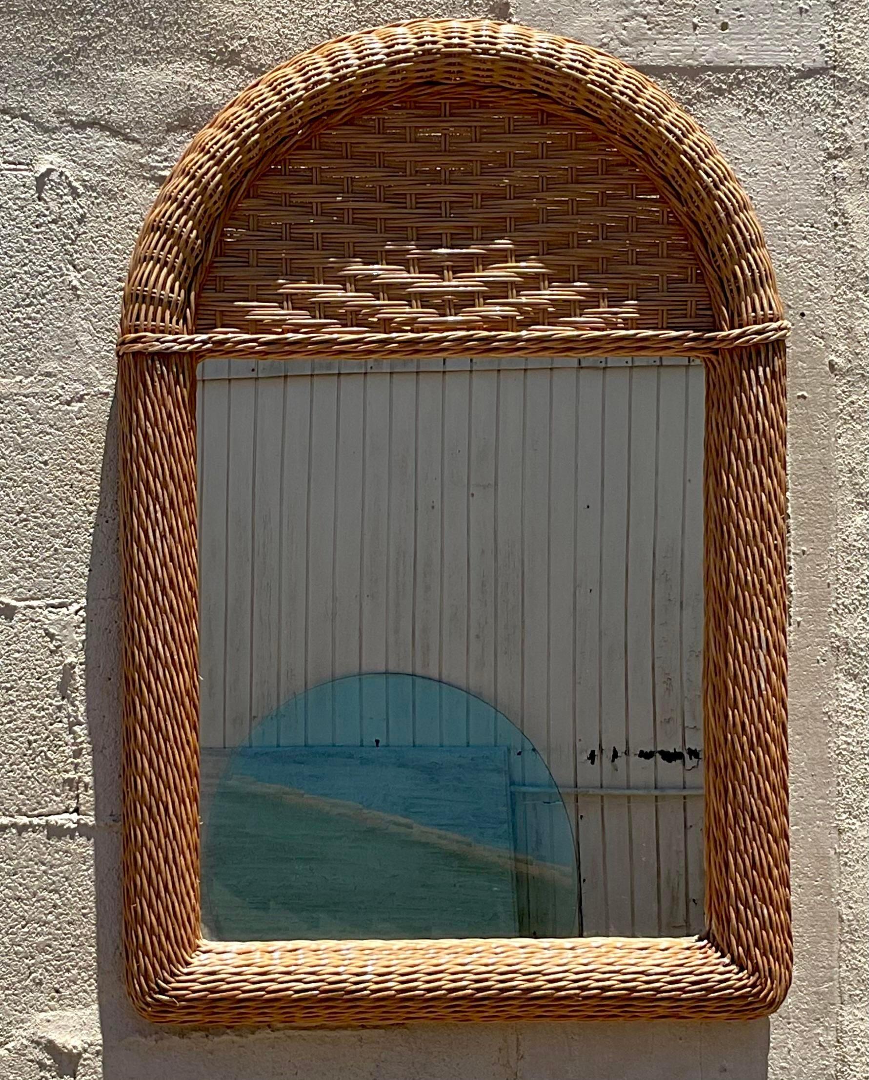 20th Century Vintage Coastal Woven Rattan Arched Mirror For Sale