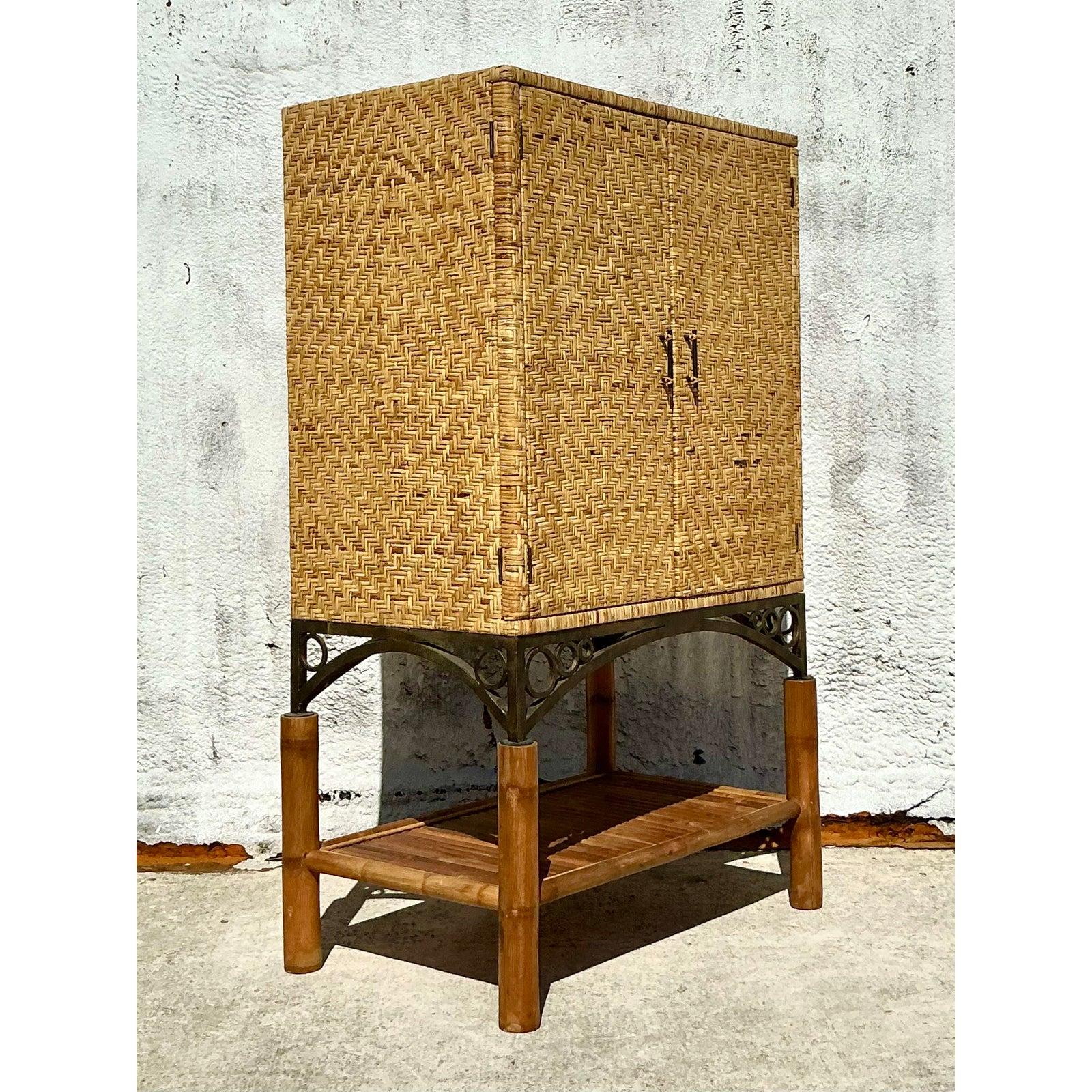 Elevate your home with this exceptional Vintage Coastal Woven Rattan Armoire, a masterful blend of organic texture, unique design, and functional elegance. This striking cabinet features a meticulously hand-woven rattan body, showcasing a