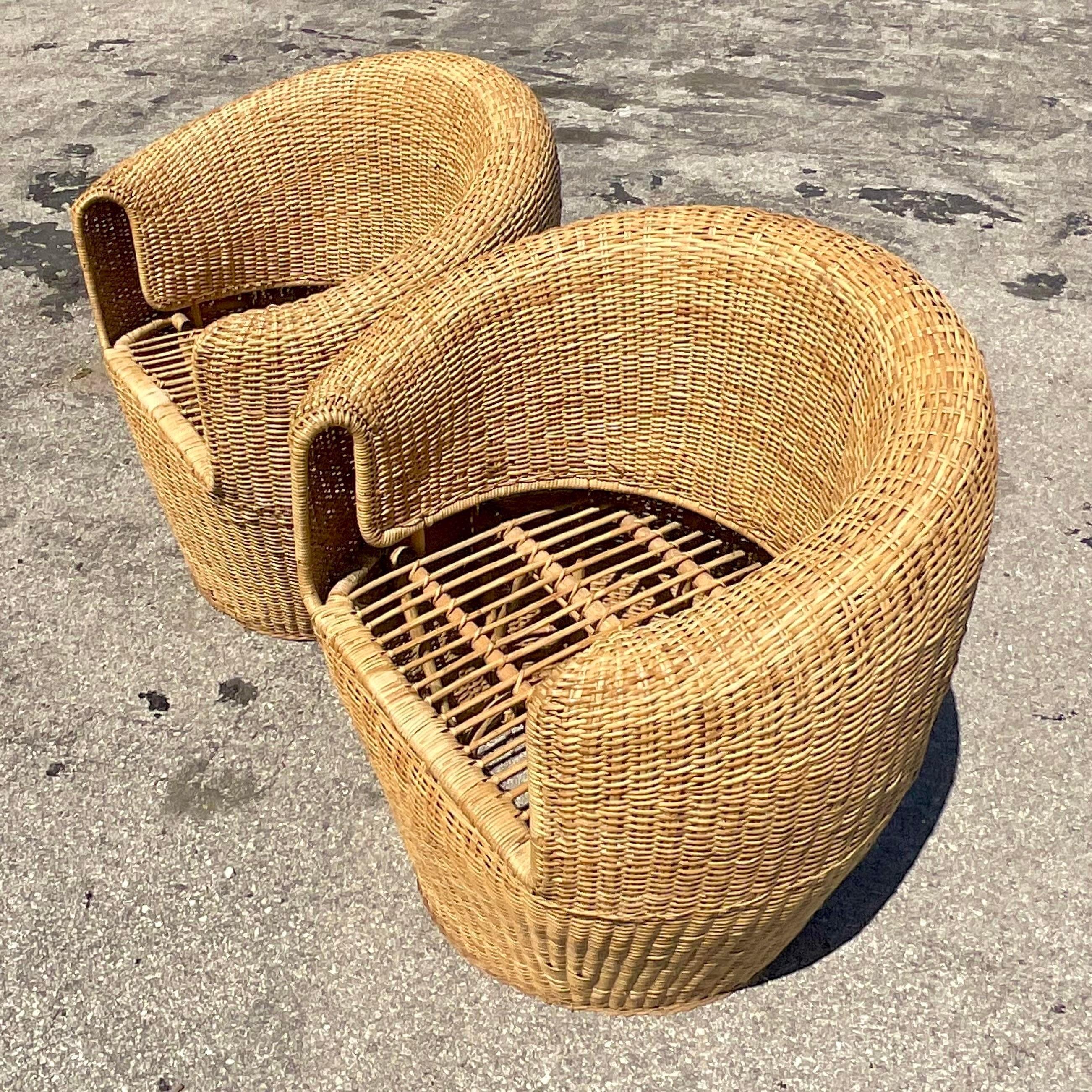 20th Century Vintage Coastal Woven Rattan Barrel Chairs, a Pair