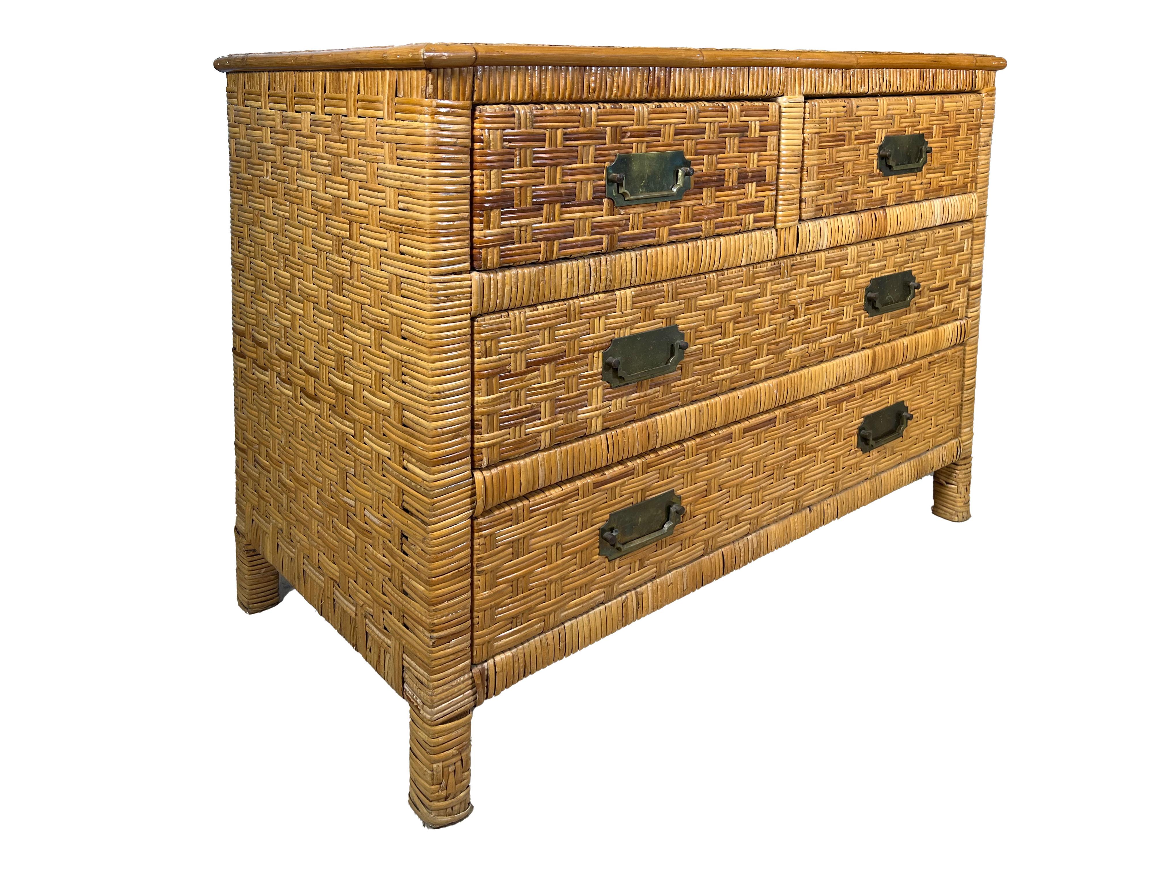 Vintage Coastal Woven Rattan Chest of Drawers with Brass Handles

Offered for sale is a delightful Coastal vintage chest of drawers with woven rattan throughout. The chest has four wooden drawers with 2 large bottom ones and 2 smaller ones at the