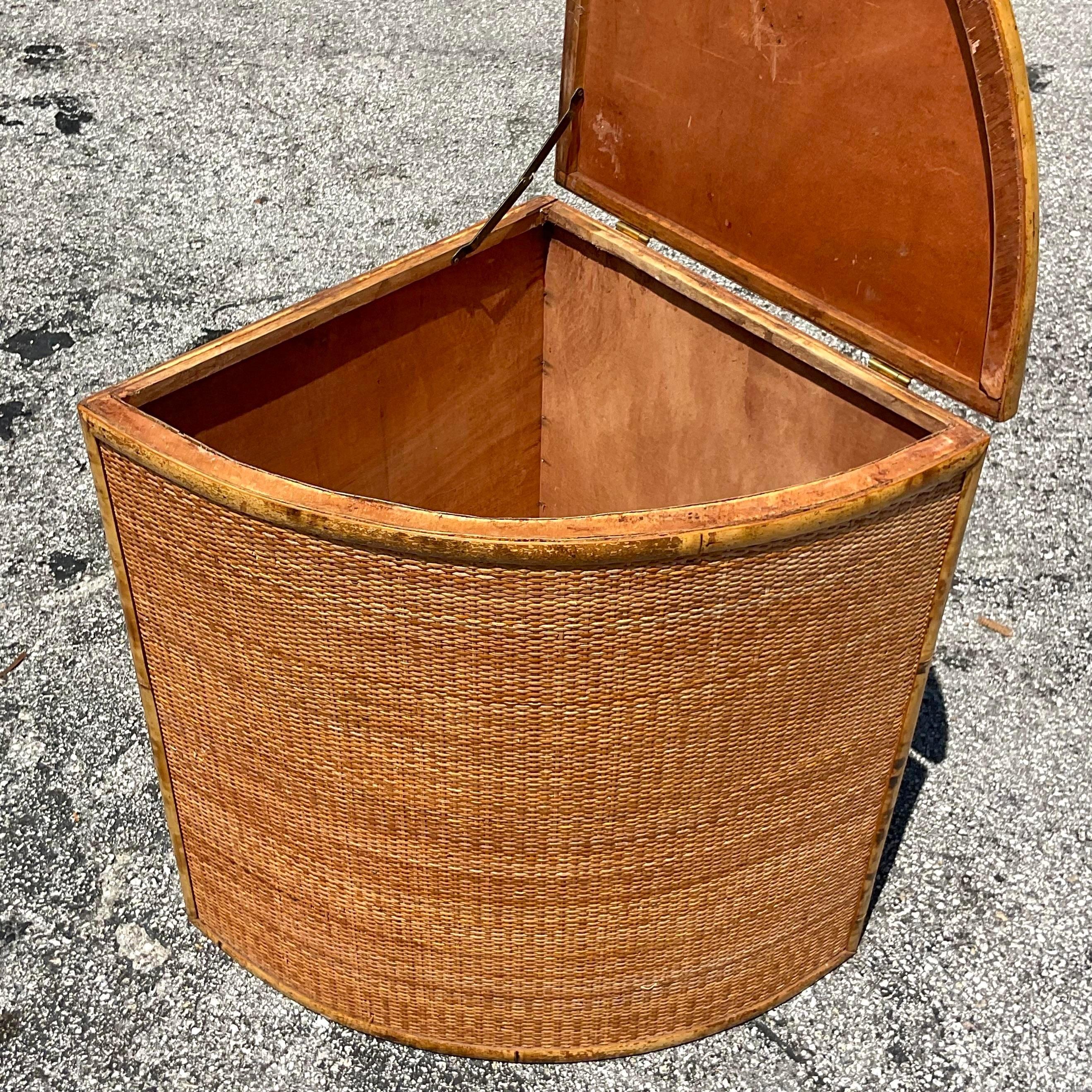 Embrace coastal charm with this Vintage Coastal Woven Rattan Corner Cabinet. Inspired by the relaxed elegance of American seaside living, its woven rattan design brings a touch of natural beauty and practical storage solutions to any room,