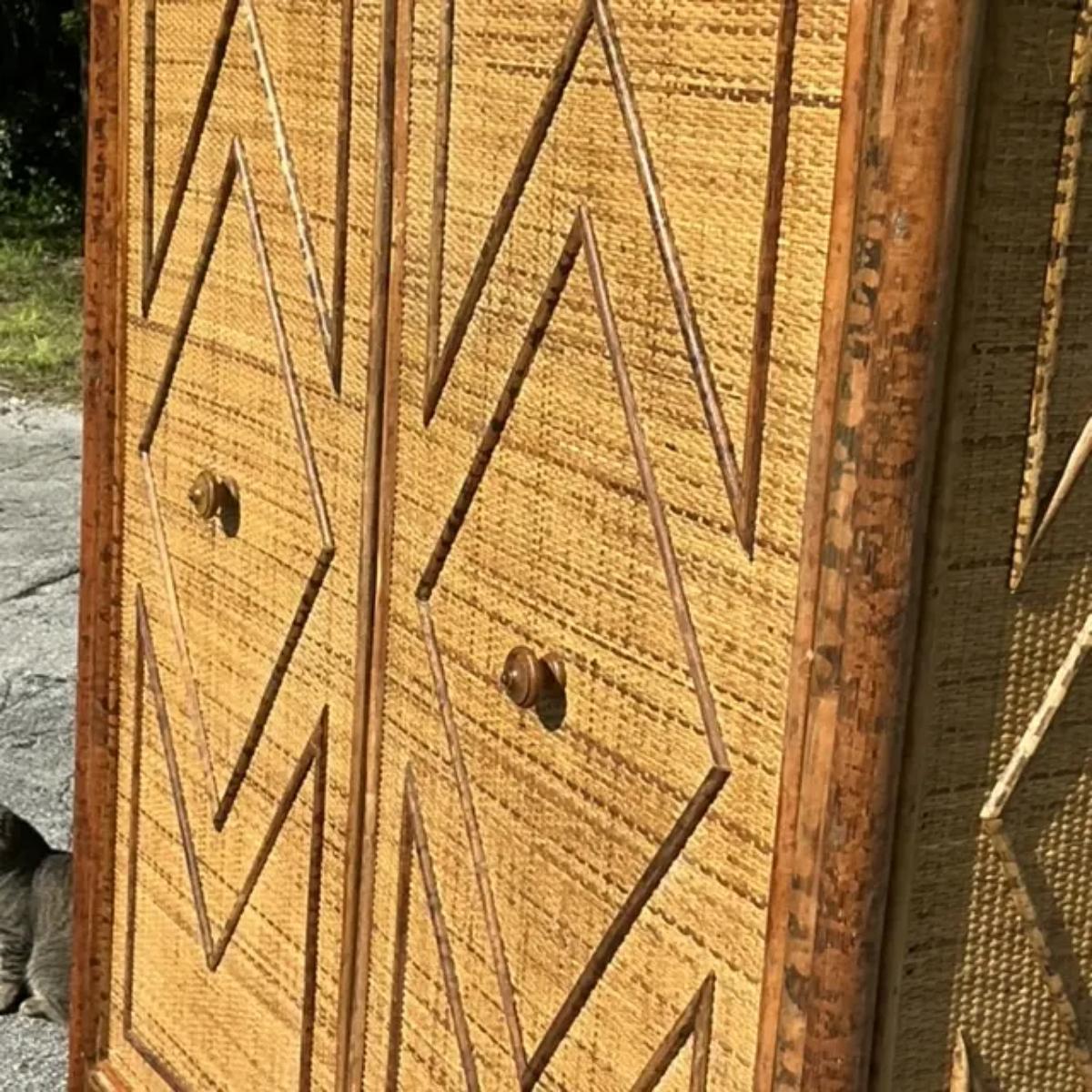 Bring a touch of coastal charm to your space with this Vintage Coastal Woven Rattan Diamond Armoire. Handcrafted from natural rattan, its intricate diamond pattern adds both texture and elegance. Perfect for beach-inspired or boho interiors, this