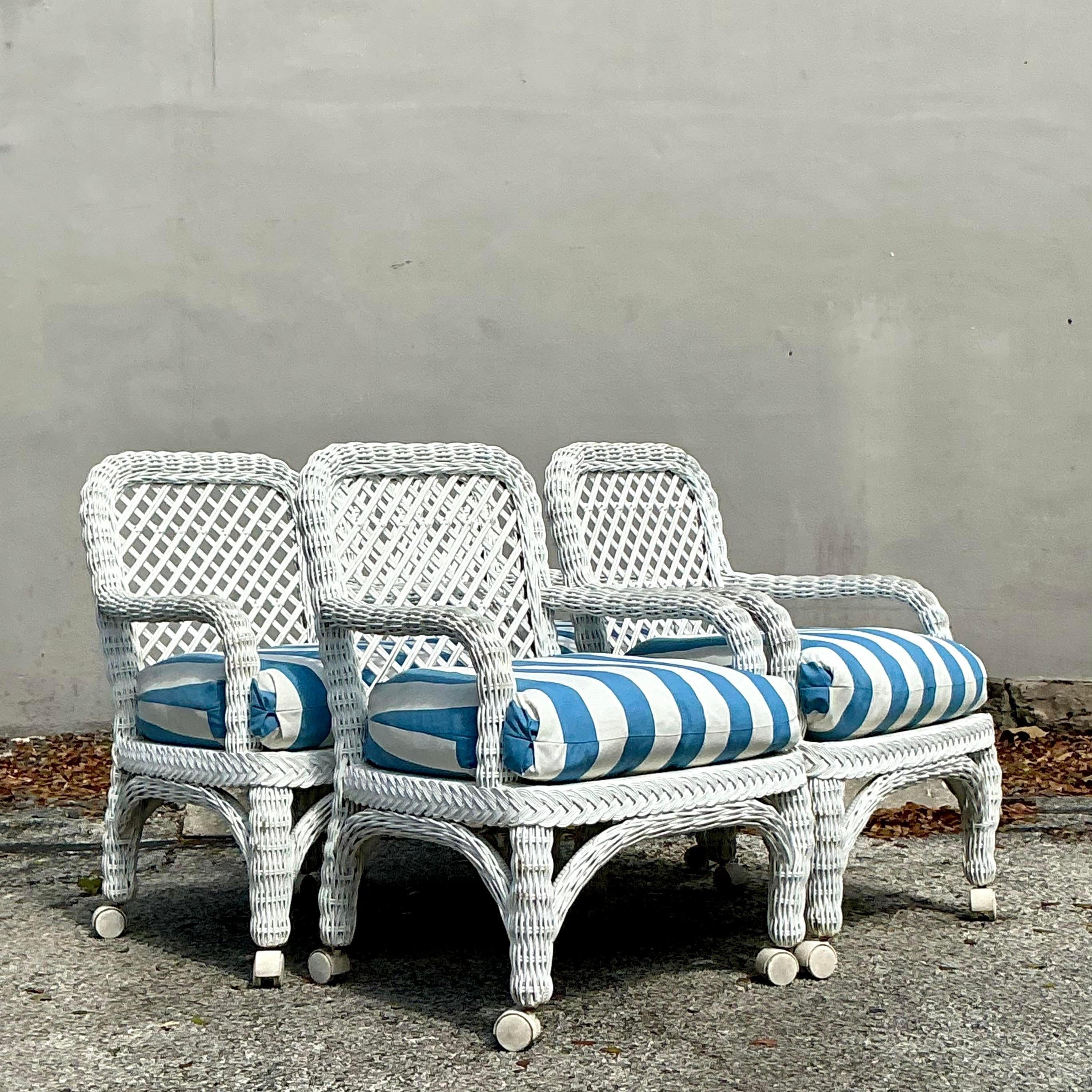 Sedie da pranzo in rattan intrecciato vintage con rotelle - Set di 4 sedie In condizioni buone in vendita a west palm beach, FL