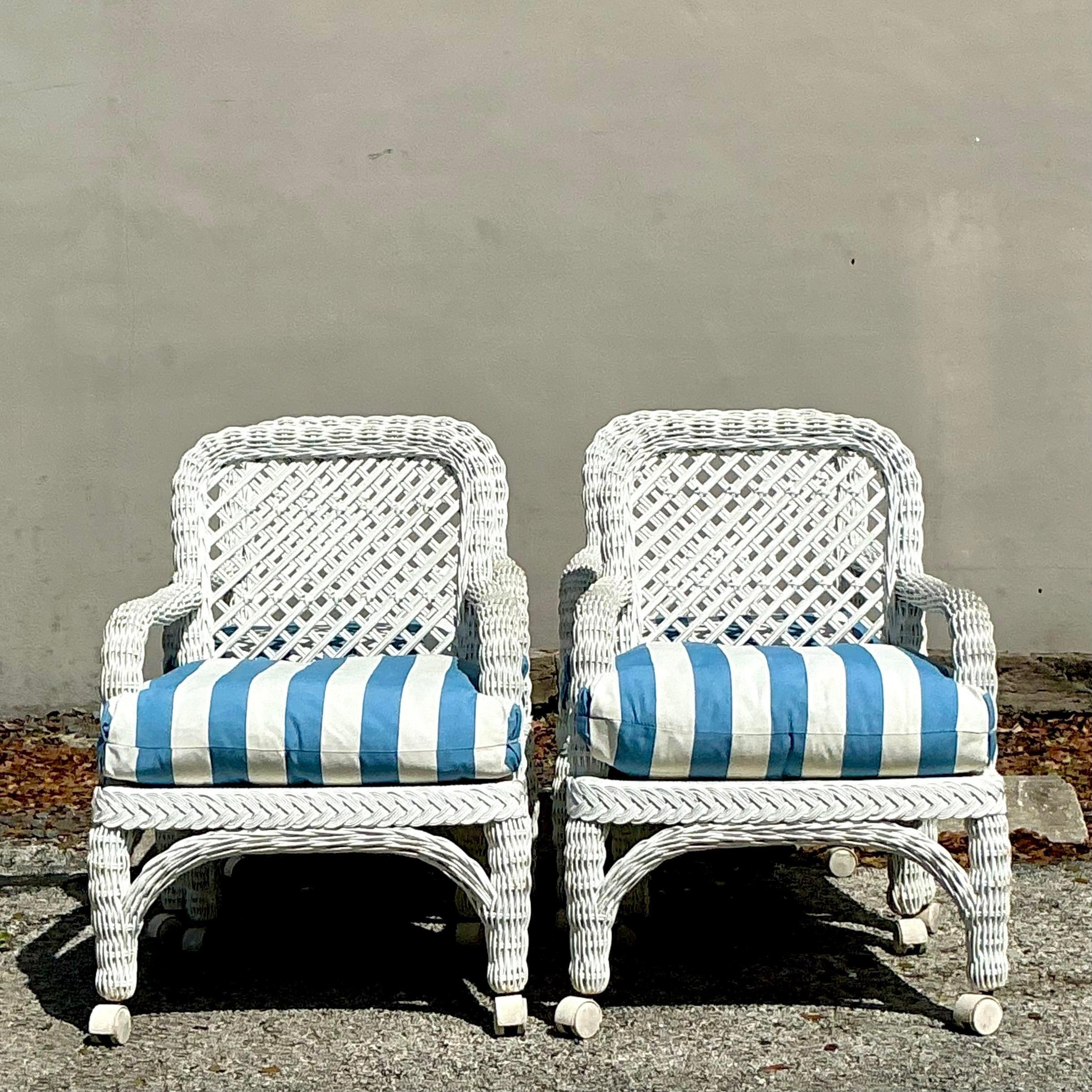 Tappezzeria Sedie da pranzo in rattan intrecciato vintage con rotelle - Set di 4 sedie in vendita