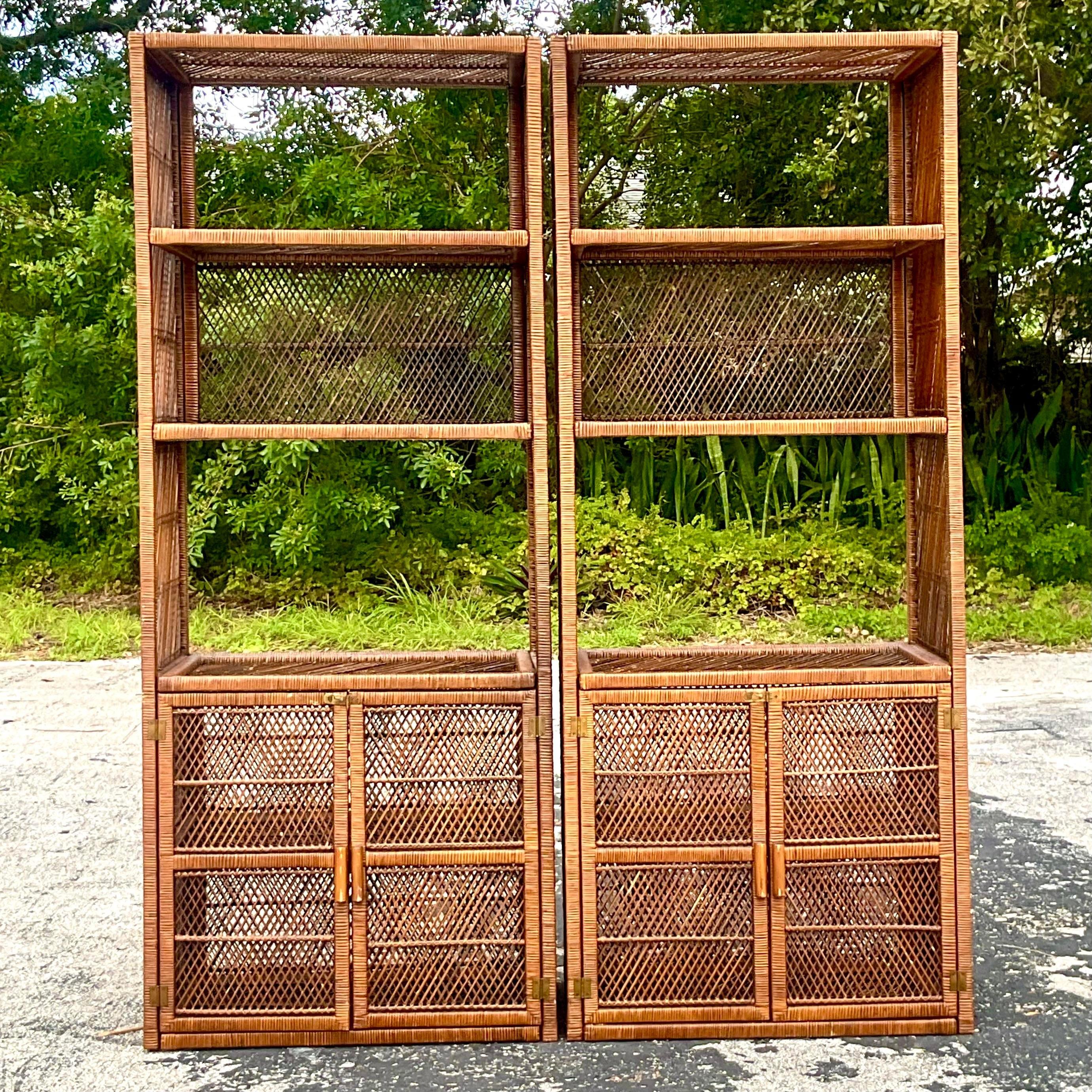 Bring a breezy, tropical vibe to your space with this pair of Vintage Coastal Woven Rattan Etageres. These charming shelving units showcase intricately woven rattan panels, adding texture and warmth, while the open-shelf design is perfect for