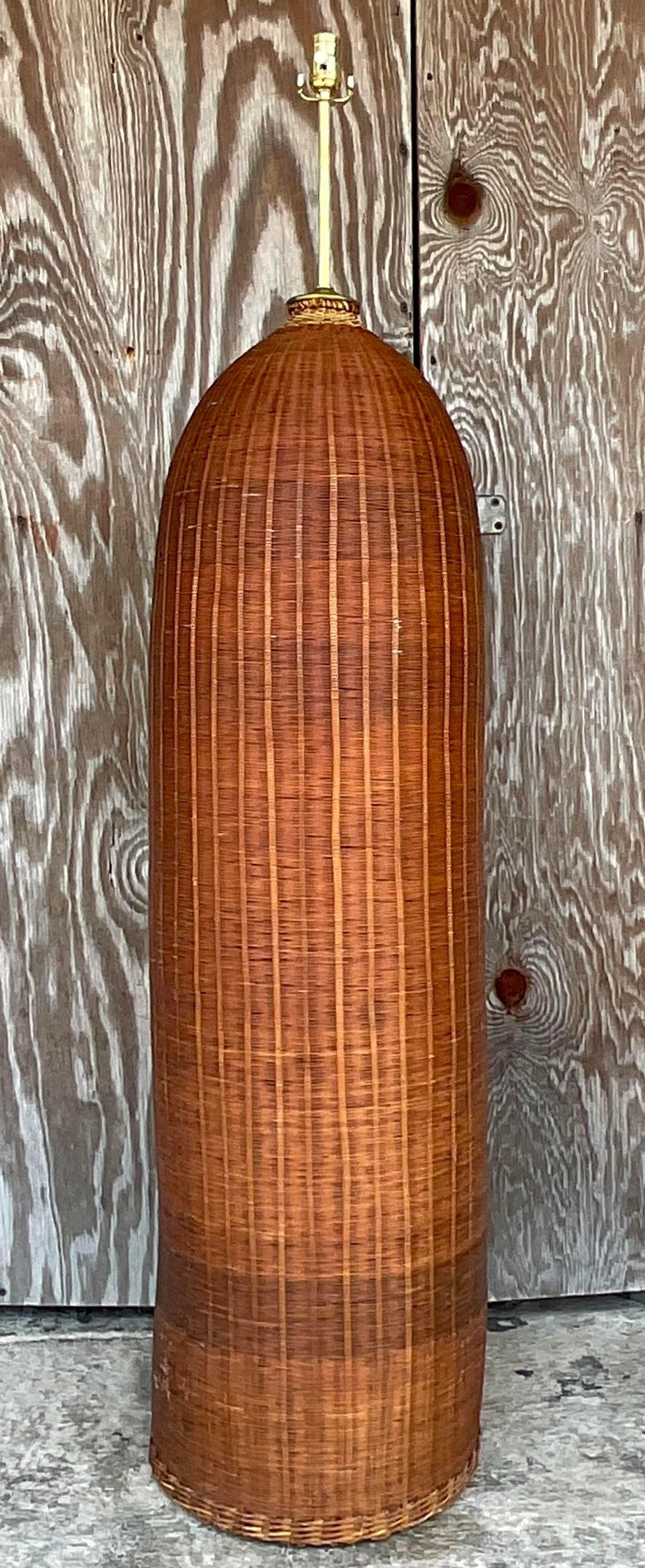 A fantastic vintage Coastal floor lamp. A chic cylinder shape in a warm brown patina. Fully restored with all new hardware and wiring. Acquired from a Palm Beach estate.