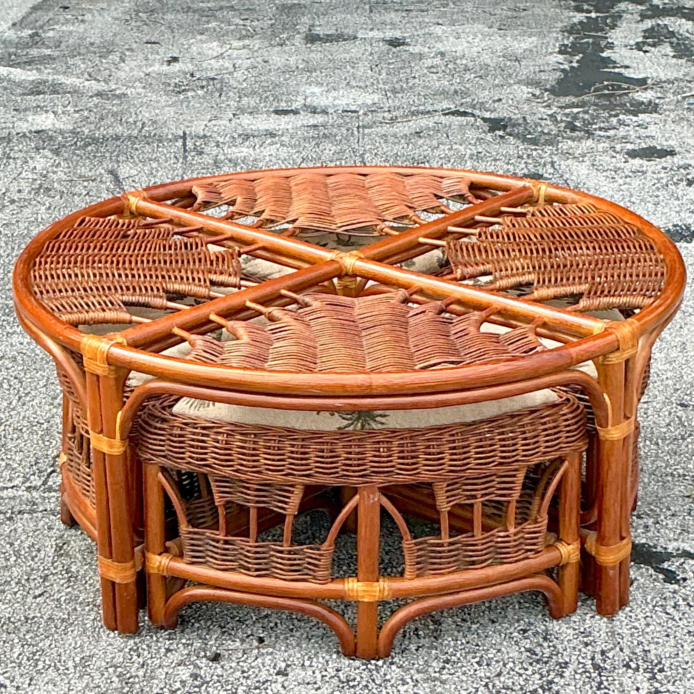 Embrace relaxed, coastal living with this Vintage Coastal Woven Rattan Low Game Table Set. Featuring a beautifully crafted rattan table and 4 matching chairs, this set exudes laid-back elegance with a natural woven texture that instantly brings a
