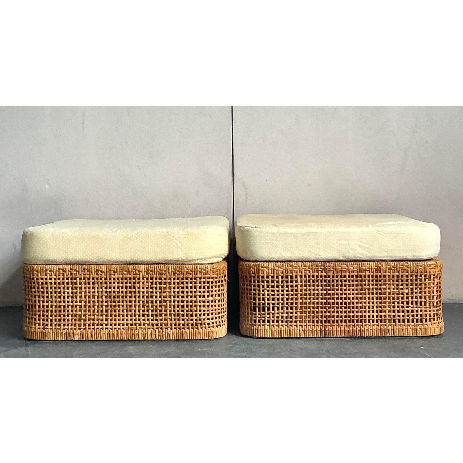Infuse your living space with the laid-back elegance of these vintage coastal woven rattan ottomans. This charming pair exemplifies timeless design, offering both versatile functionality and a touch of natural texture to any room. Each ottoman is