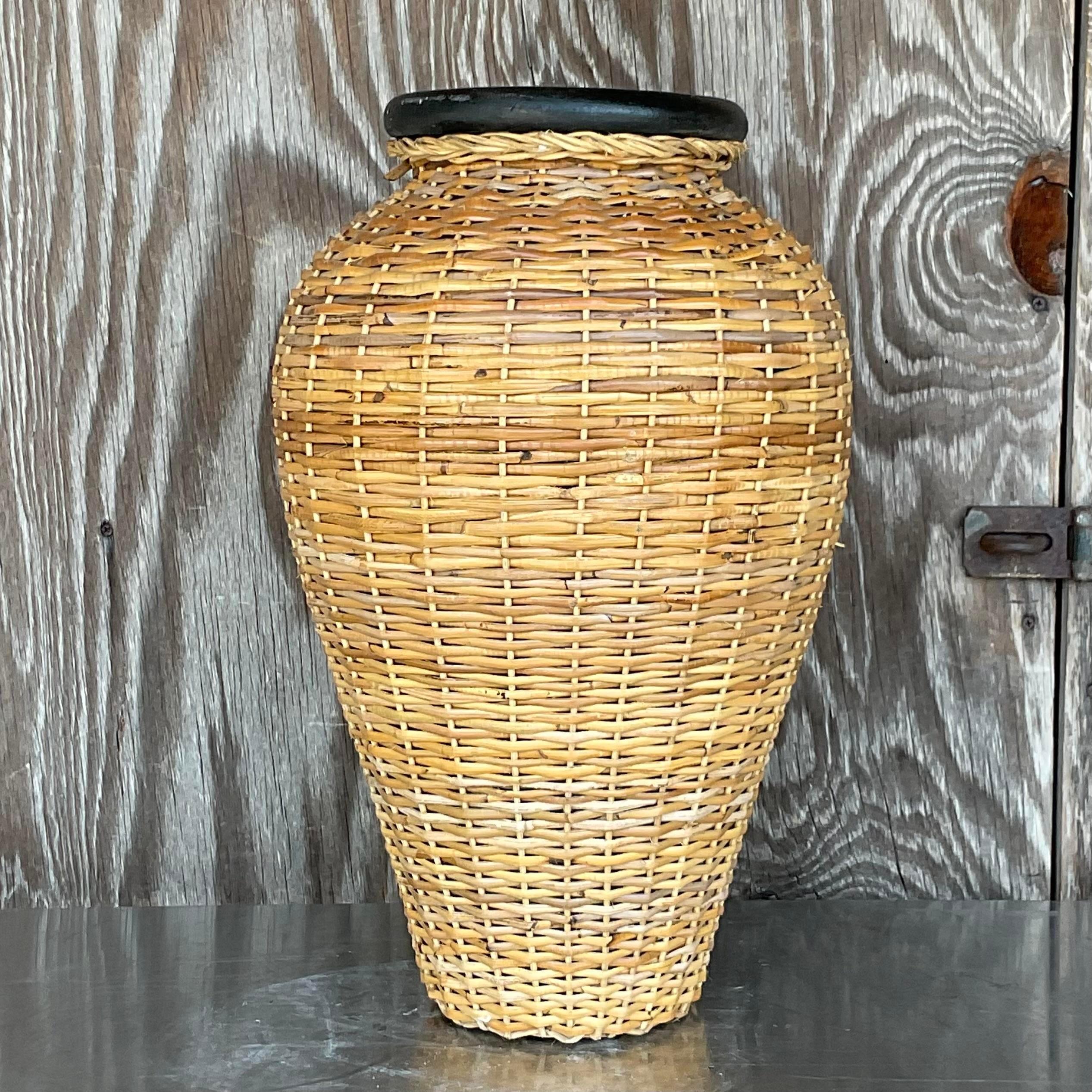 North American Vintage Coastal Woven Rattan Over Terra Cotta Vase For Sale