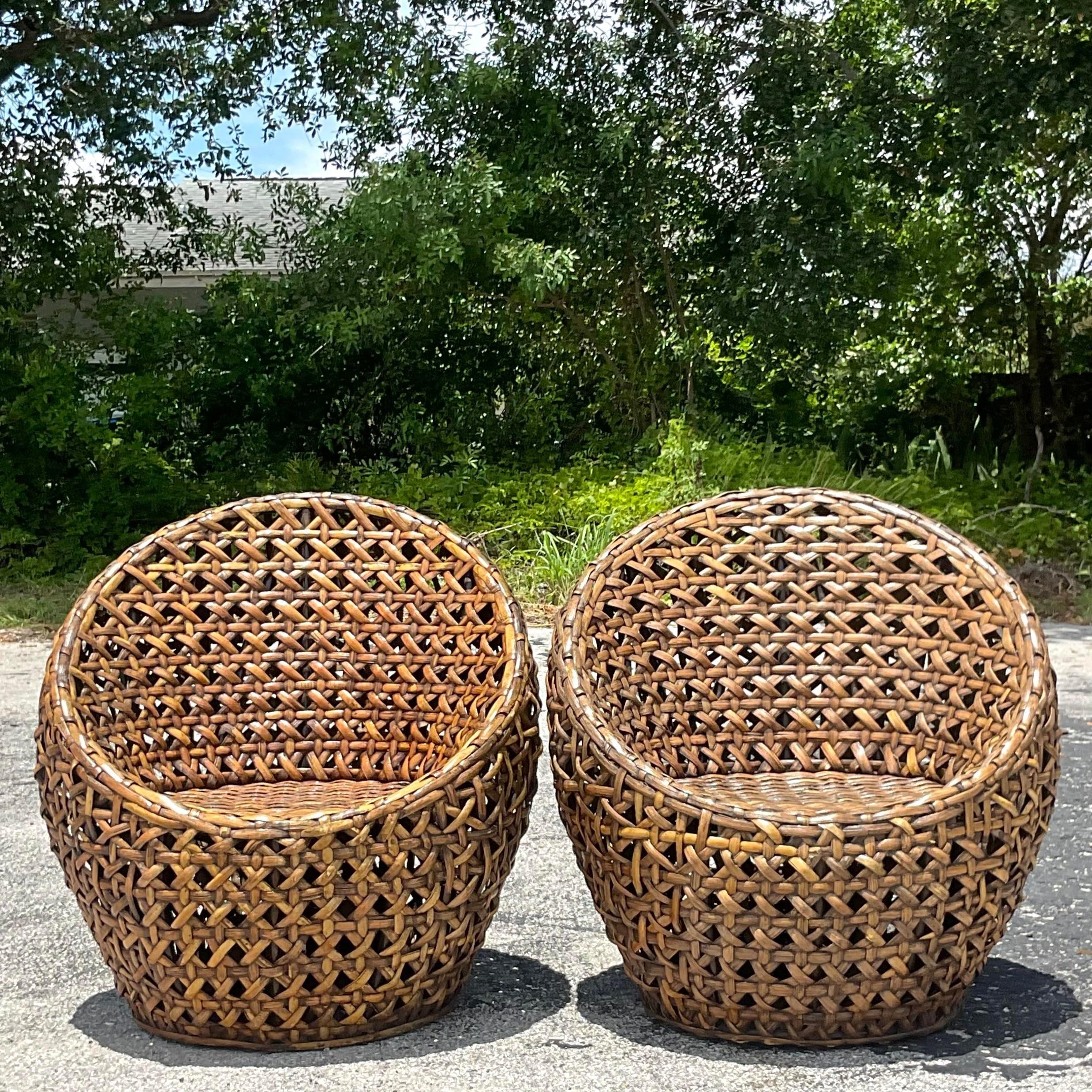 Vintage Coastal Woven Rattan Pod Chairs, a Pair In Good Condition In west palm beach, FL