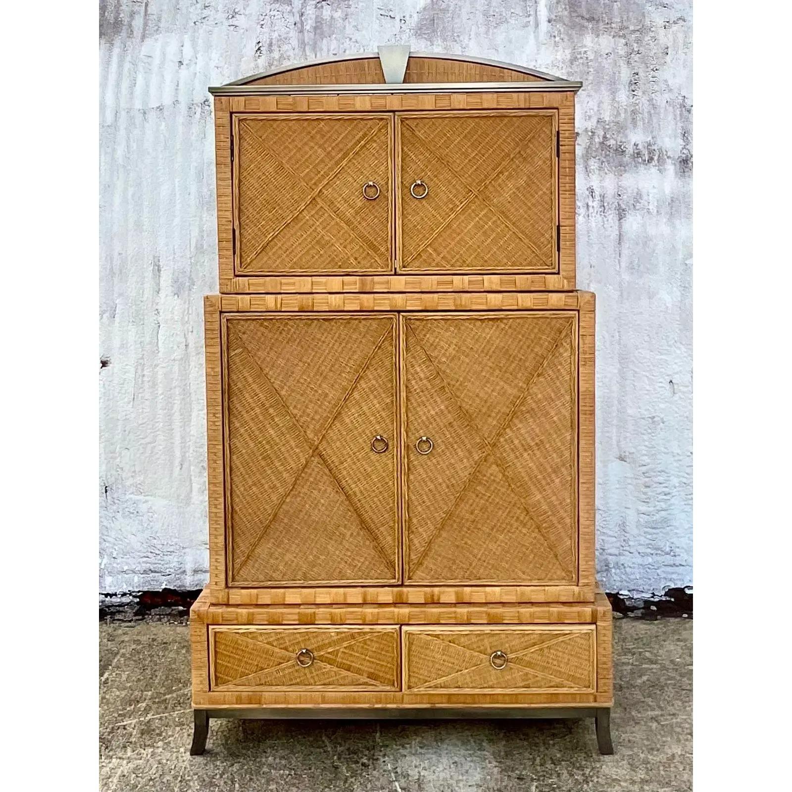 Fantastic vintage Coastal armoire. Beautiful woven rattan cabinet with a chic diamond motif. A stacked design that allows the user to simply stack the three pieces to create this dramatic armoire. Great if you need an armoire and you are challenged