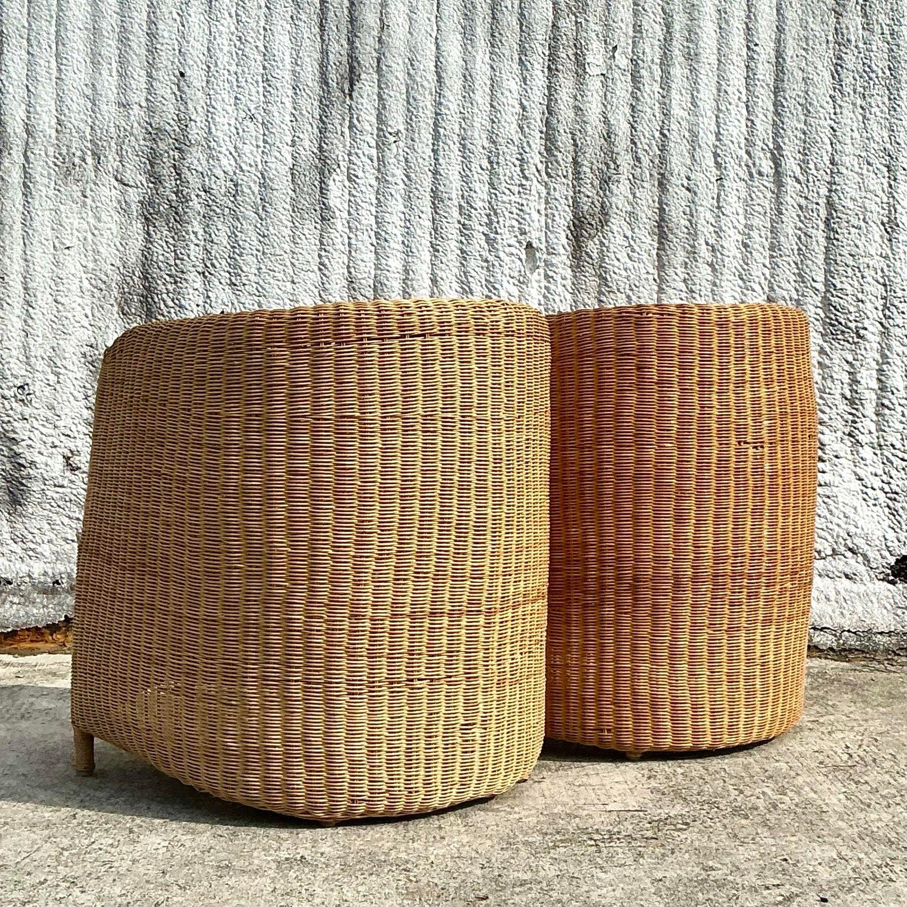 Relax in style with this pair of vintage coastal woven rattan tub chairs. Featuring a cozy barrel-back design and intricate natural weaving, they bring breezy charm and casual elegance to any space. Perfect for a sunroom, patio, or coastal-inspired