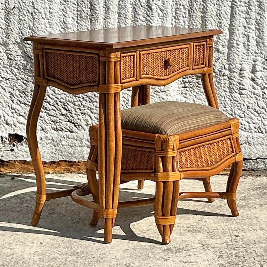 Bring effortless coastal charm to your space with this vintage woven rattan vanity and matching bench. Featuring intricate rattan craftsmanship and a breezy, natural finish, it’s both stylish and functional. Perfect for a bedroom or dressing area