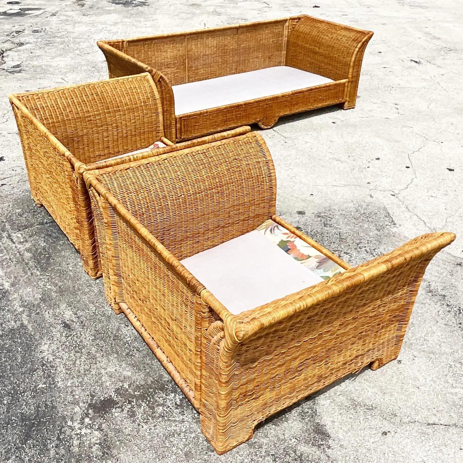 Fantastic set of vintage Coastal sofa and two lounge chairs. Beautiful wing design with high areas and back. A full set of cushions included in the purchase. Acquired from a Palm Beach estate.

Chair dimensions 43.5 x 33.5 x 24.5 x 11.