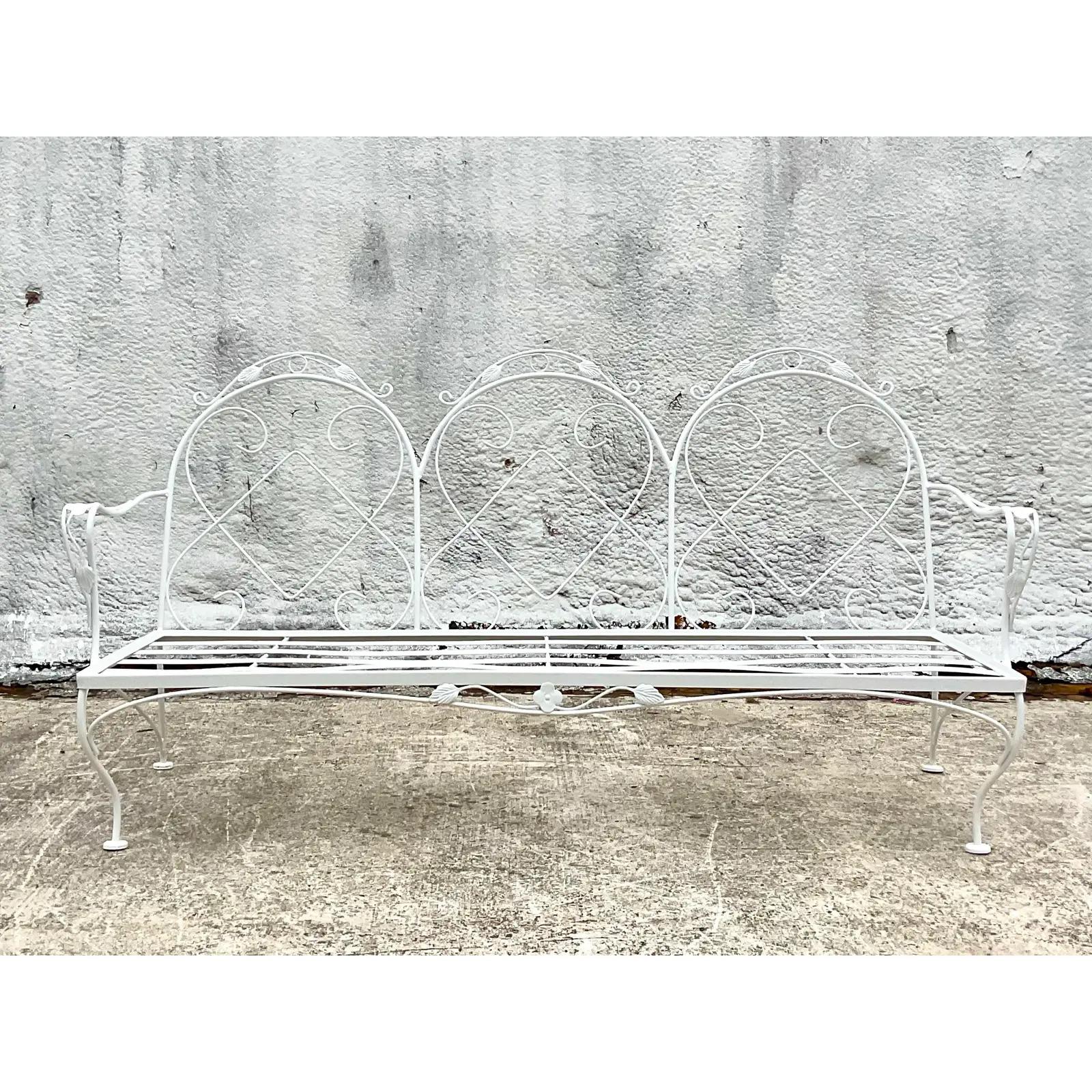 Vintage Coastal Wrought Iron Sofa. A really beautiful and unusual design. All new sandblasting and powder coating in a high gloss white. Acquired from a Palm Beach estate.
