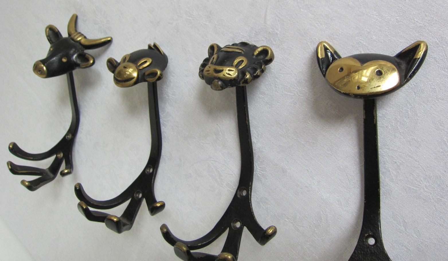 Carved Vintage Coat hooks in shape of cat, lion, cow and monkey, 1950s Walter Bosse For Sale