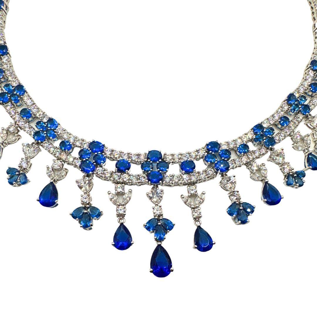 Inside Diameter: 5.88  ”

Bin Code: A4 / P7

Step into a world of refined elegance with this Vintage Cobalt Blue and Clear Cut Glass Sterling Necklace Collar. Crafted with meticulous attention to detail, this extraordinary piece showcases the